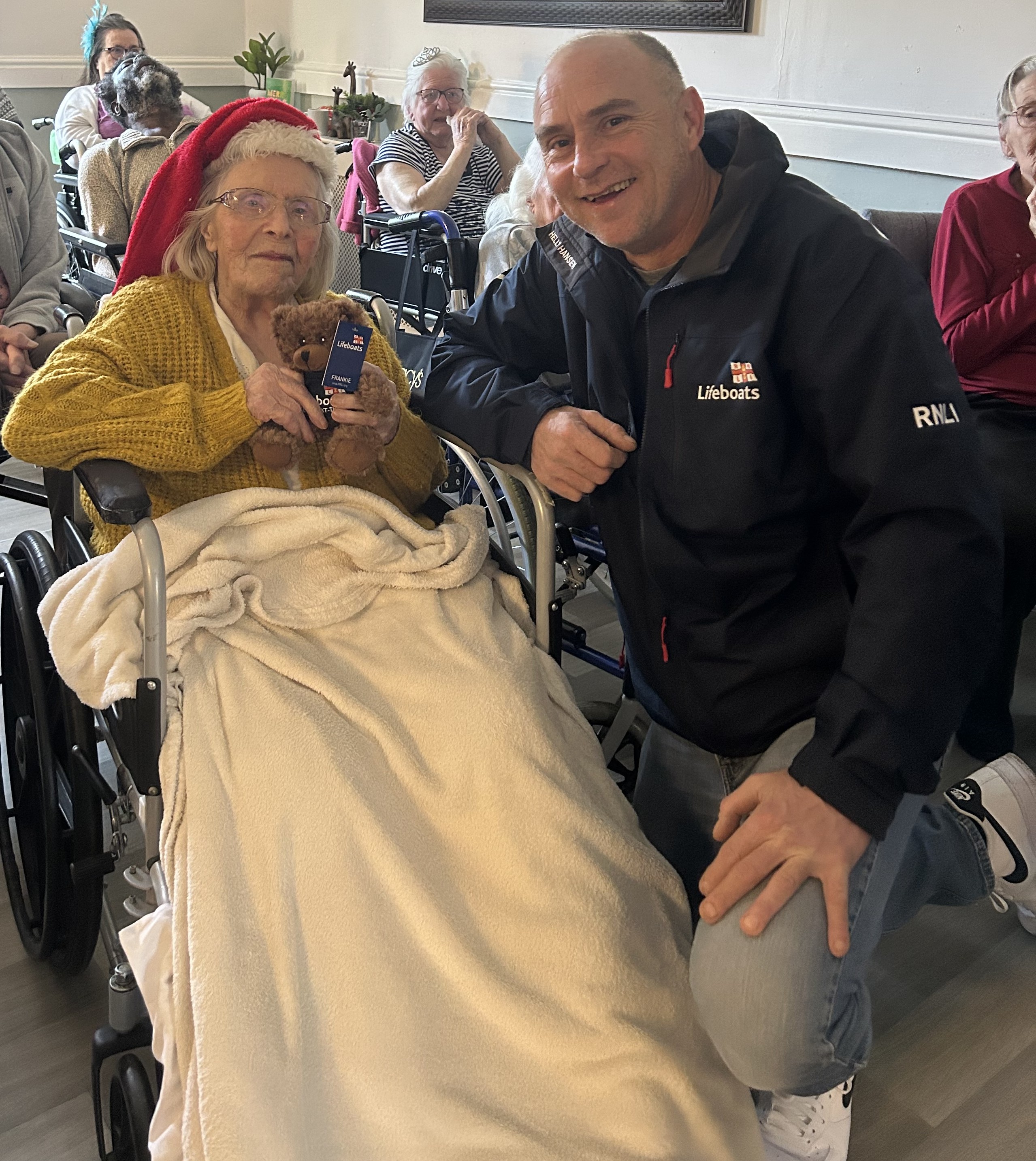 Anita Twine with RNLI James Betteridge at Anita's 105 birthday celebration
