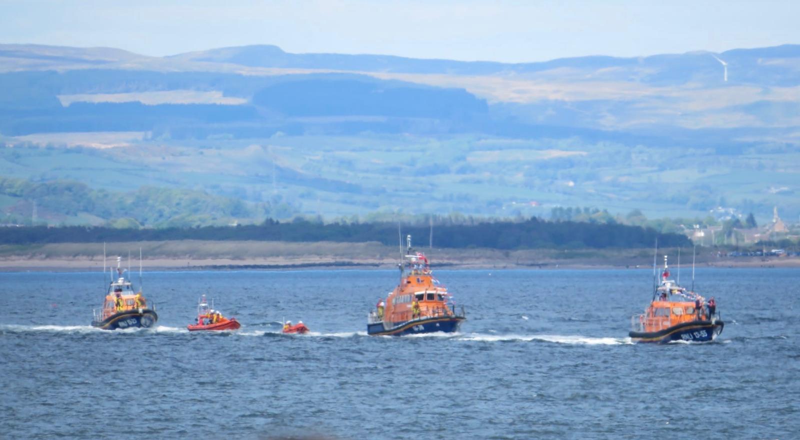 The new Troon Shannon heading to Troon escorted by other RNLI lifeboats