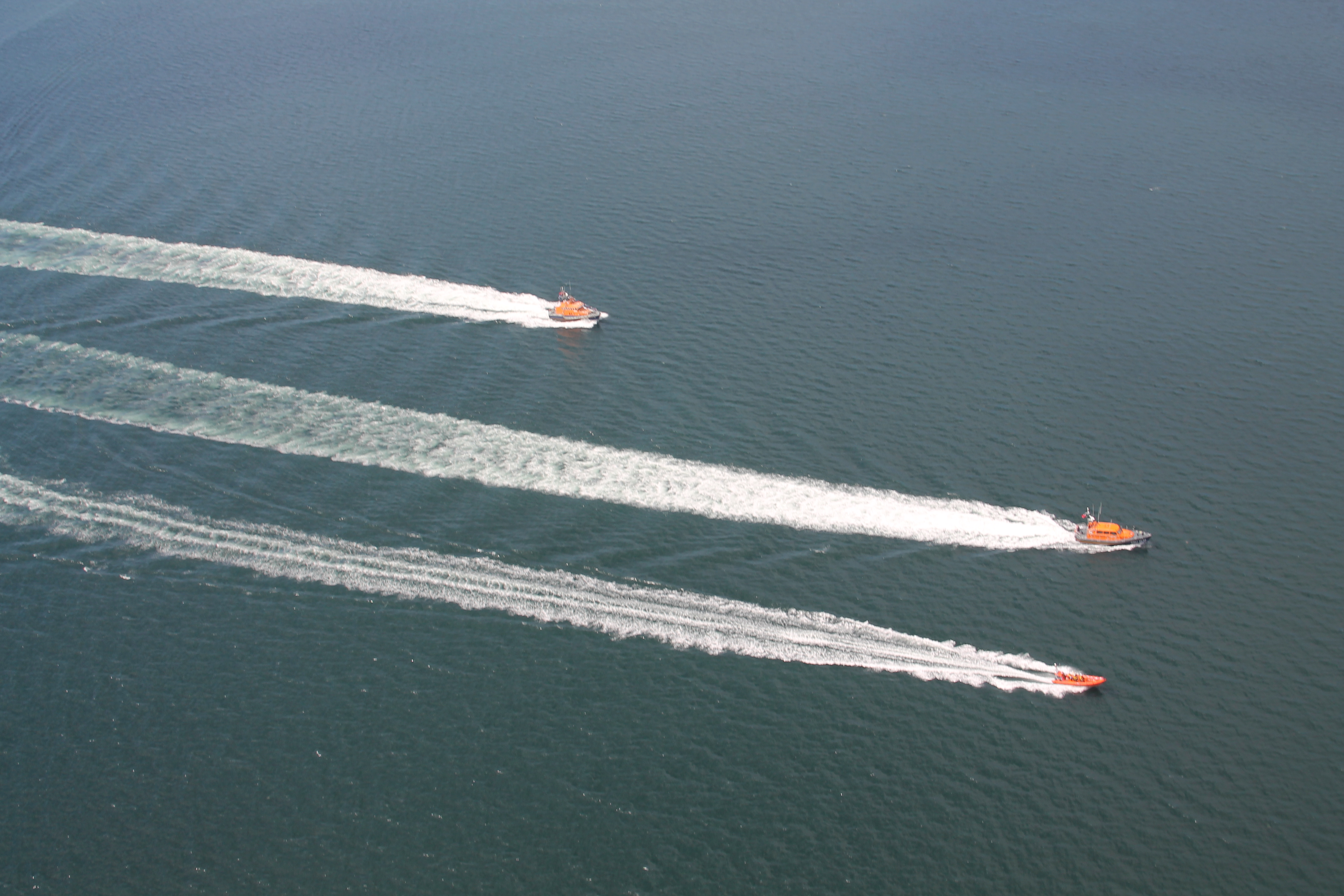 The new Troon lifeboat being escorted to Troon from the air