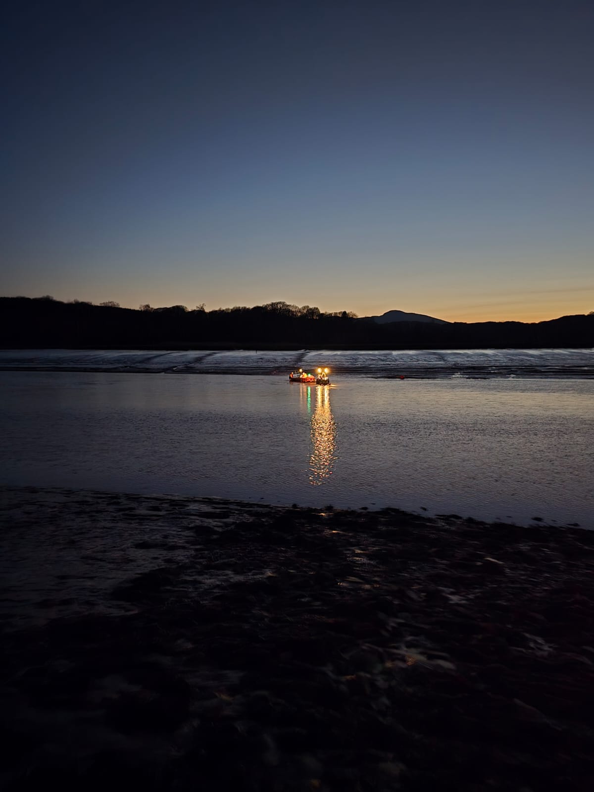 Kippford Lifeboat launches at night time