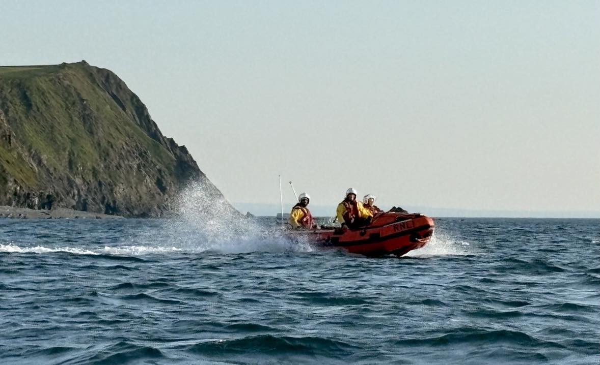 Borth RNLI having just launched and headed towards Ynyslas beach. Photo taken from the water
