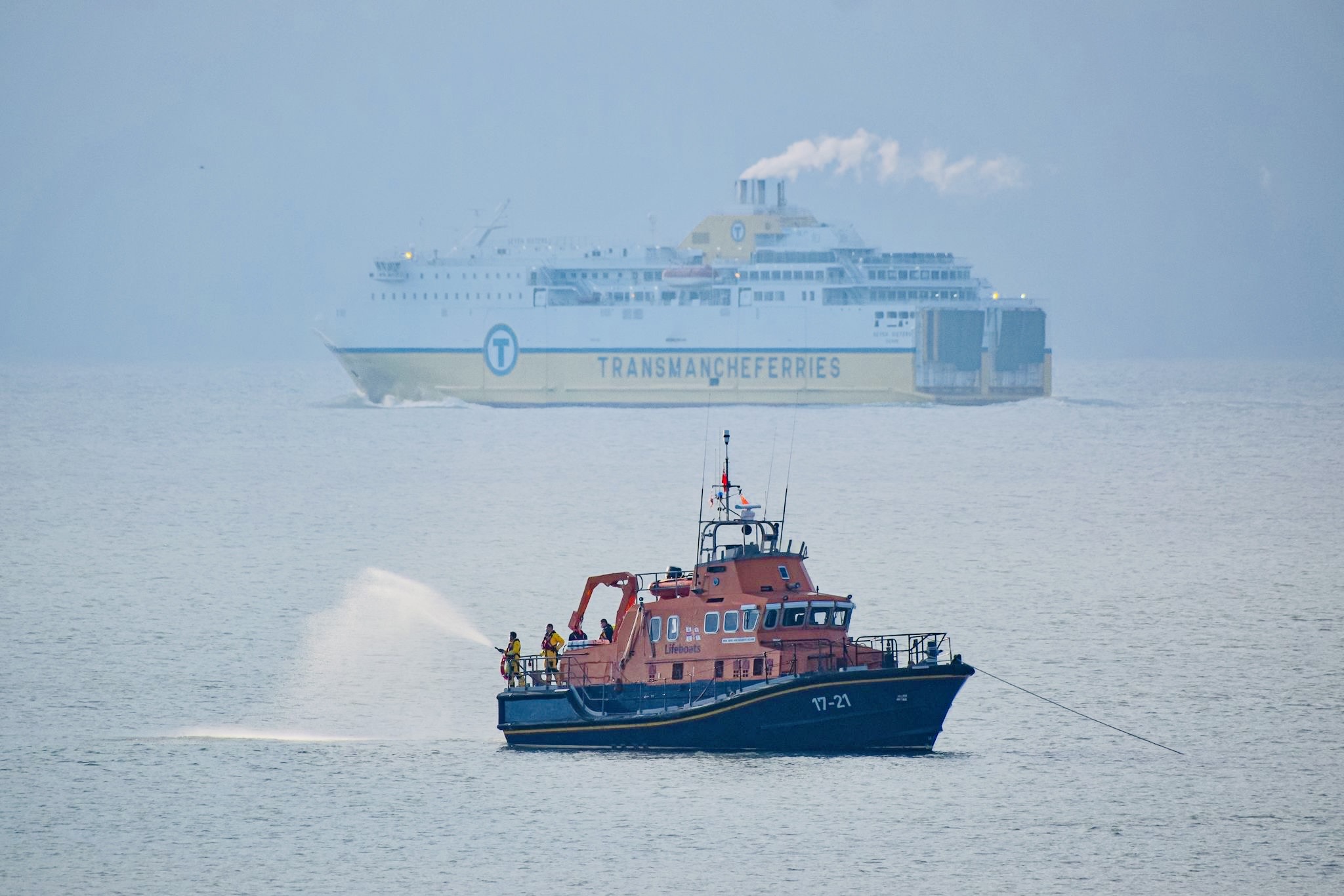 Newhaven RNLI's Severn class all-weather lifeboat and DFDS ferry in background