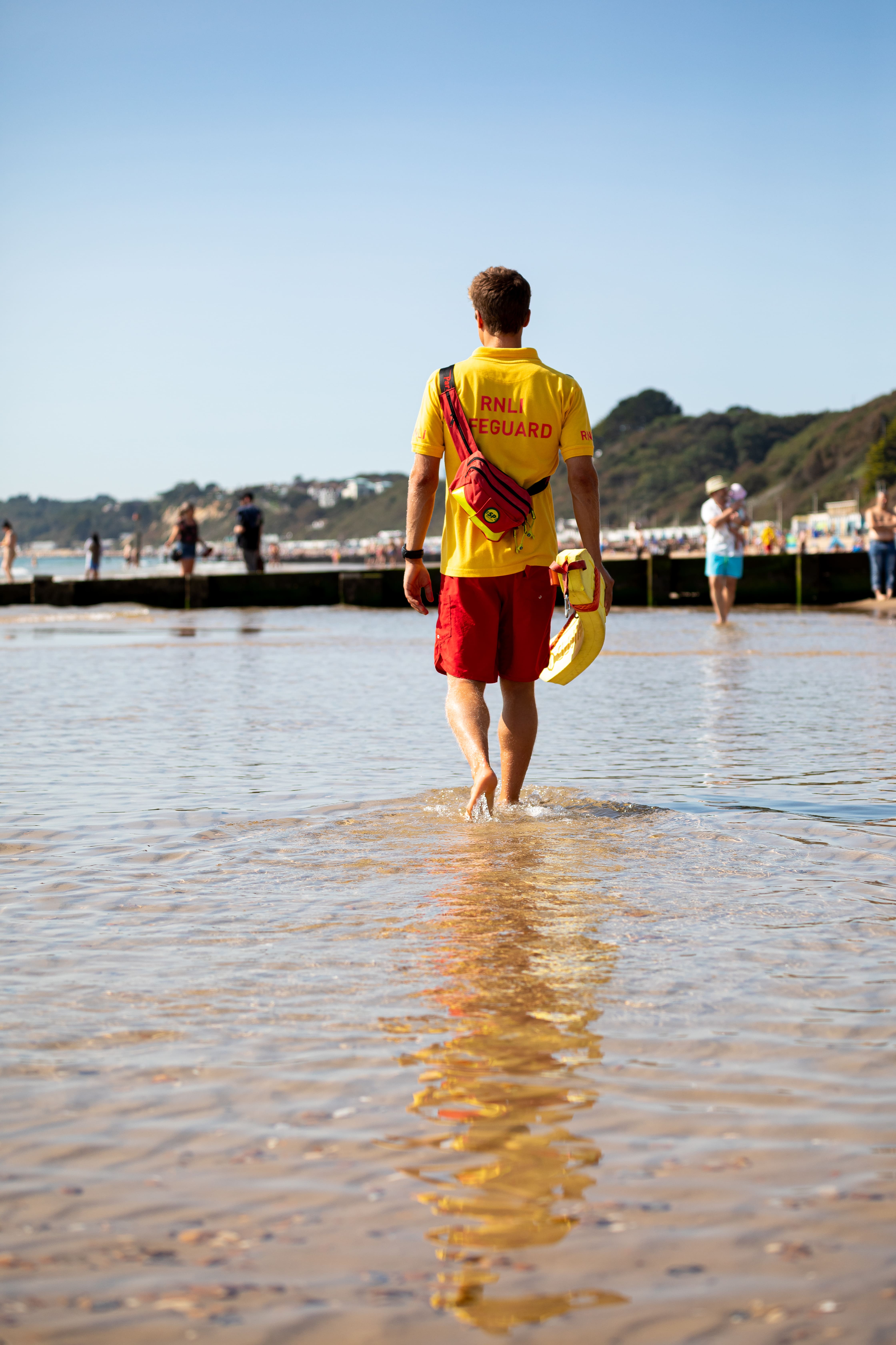 An RNLI lifeguard on patrol