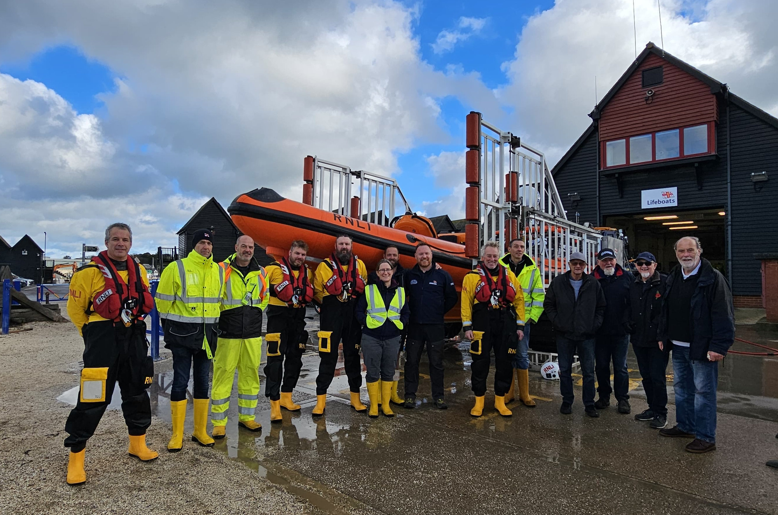Mike Peters (far right) and some of his fellow musicians with members of Whitstable RNLI on Sunday morning.