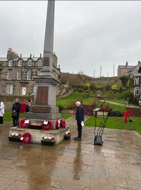 Retired Crewman Fundraiser Michael Ross Laying wreath at Spittal War Memorial