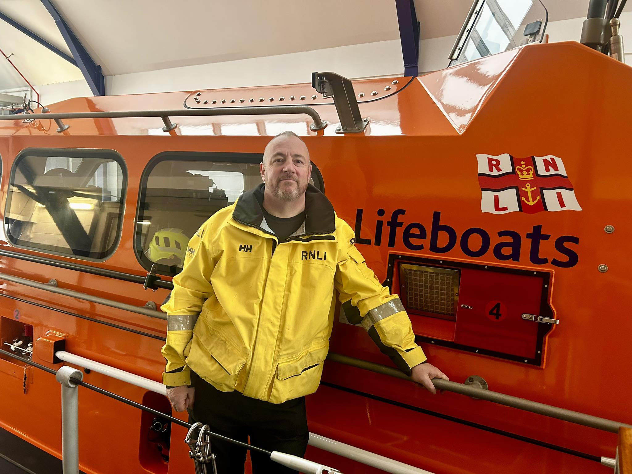 Les Howell stood aboard the Shannon class Lifeboat