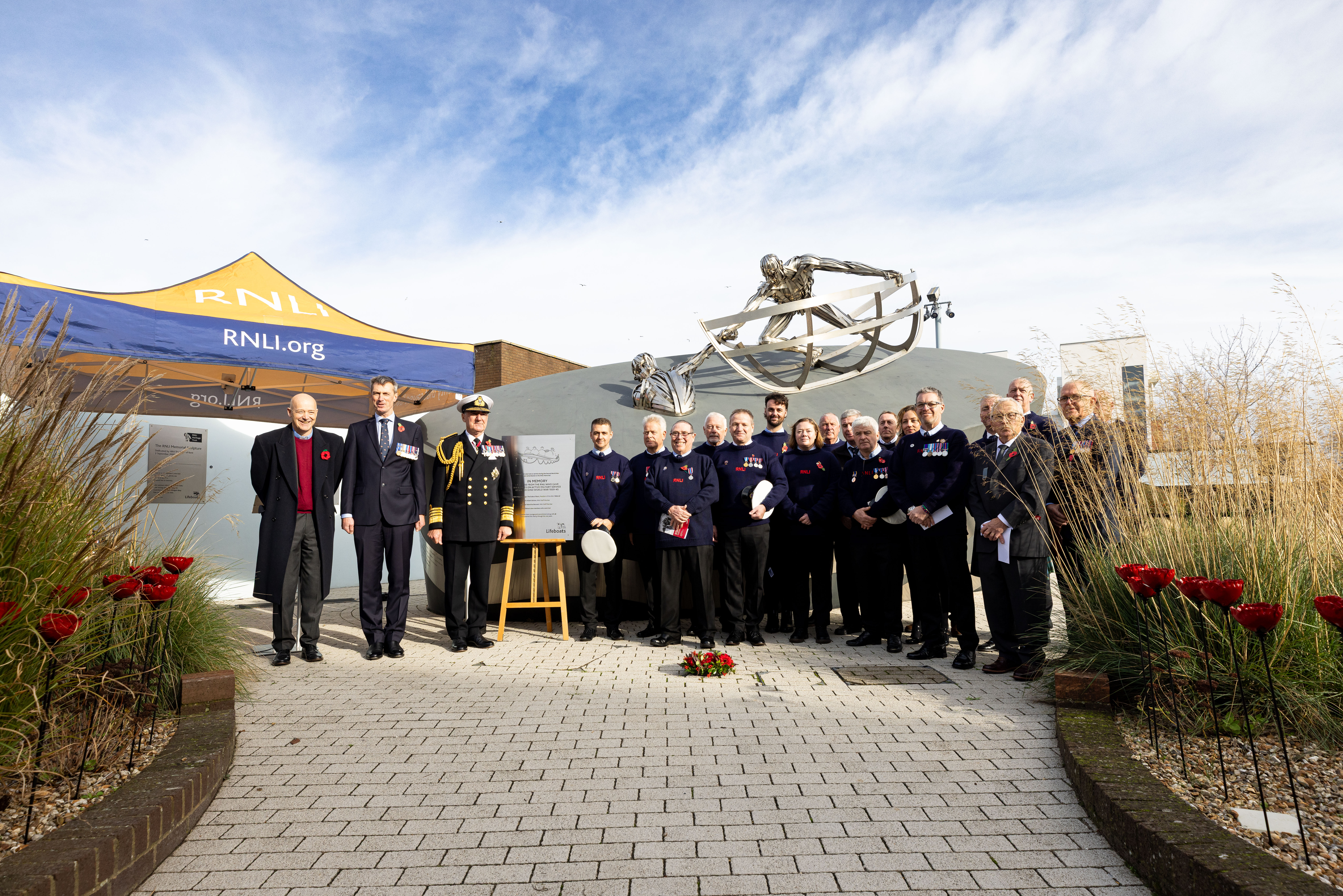 Reverend Peter Myres, Peter Sparkes, Chief Executive of the RNLI, Admiral Sir George Zambellas and representatives from the 12 stations that lost crew members in RNLI service during the Second World War