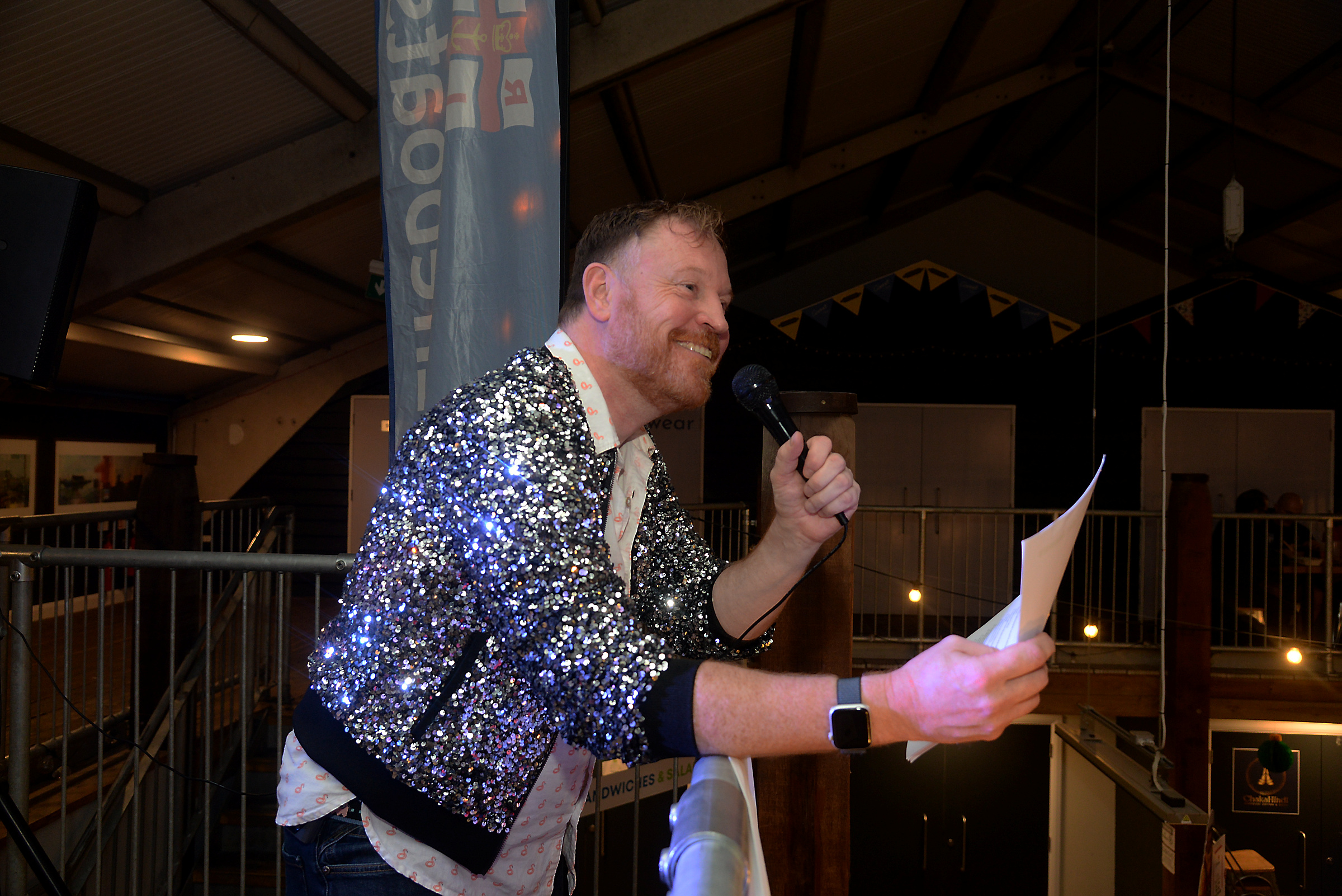 Question Master John Baker in charge of affairs at the Whitstable RNLI Charity Quiz Night held in the South Quay Shed on Saturday evening.