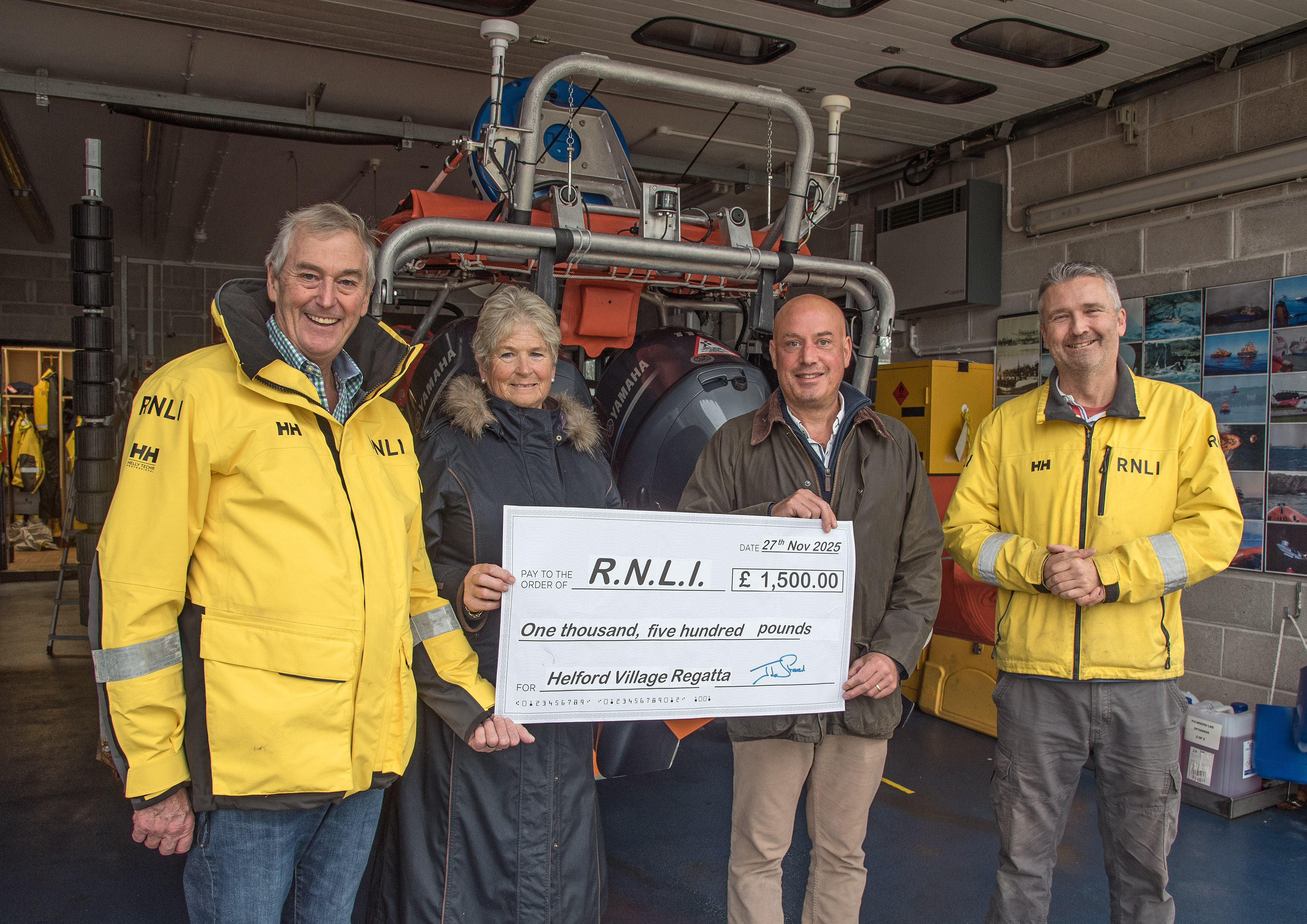 Left to right: Lifeboat Operations Manager Nick Lewis, Jane Benney, Chris Newman and ALB Mechanic Andy Edwards