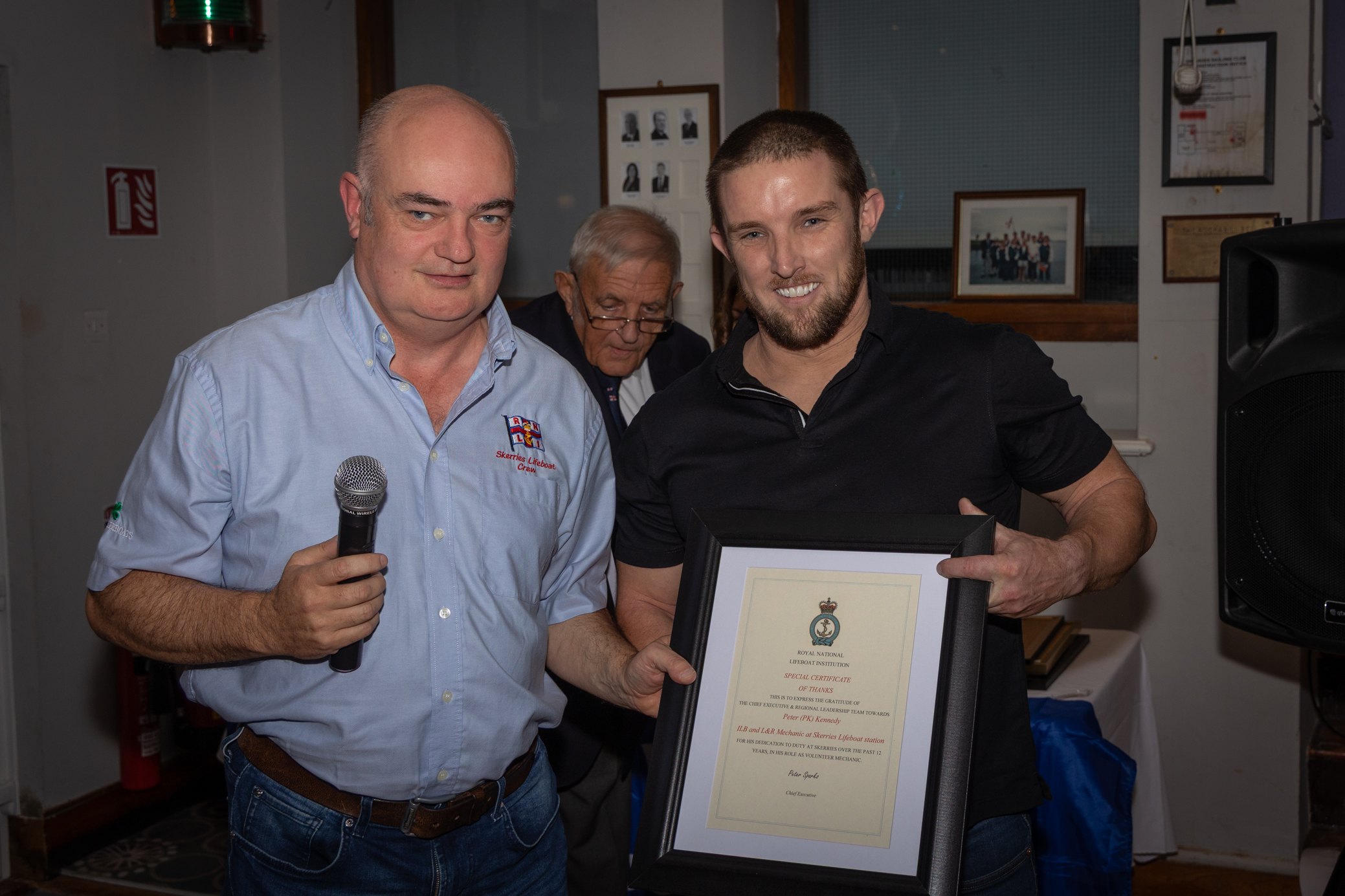 Area technical manager Conor Walsh presenting Peter Kennedy with a certificate of thanks.