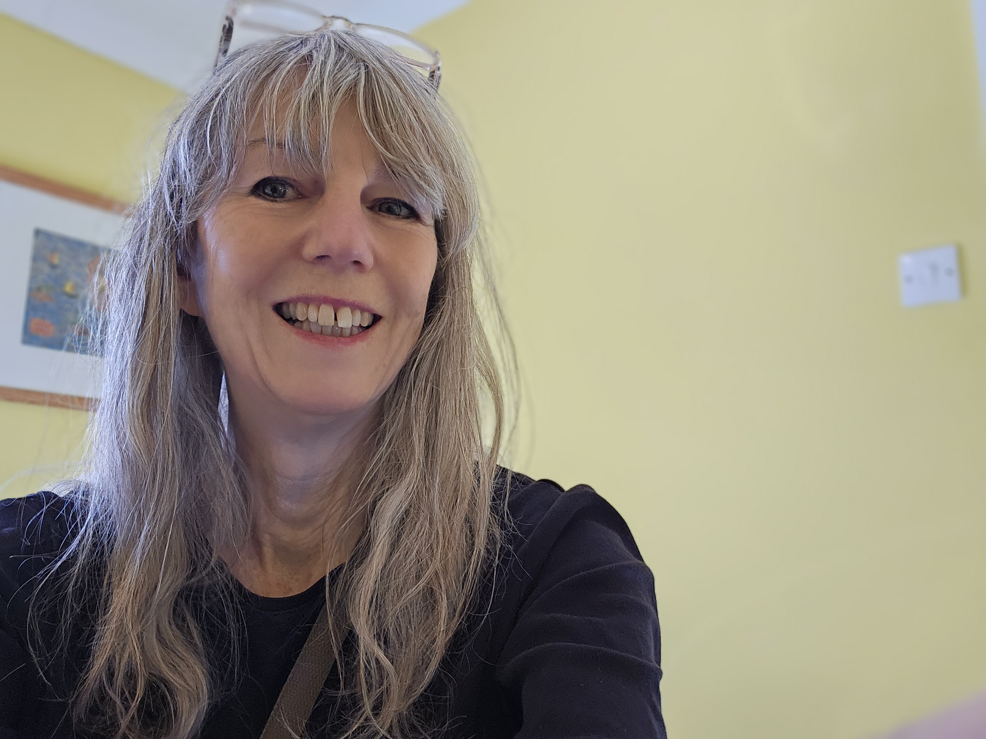 Woman smiling.