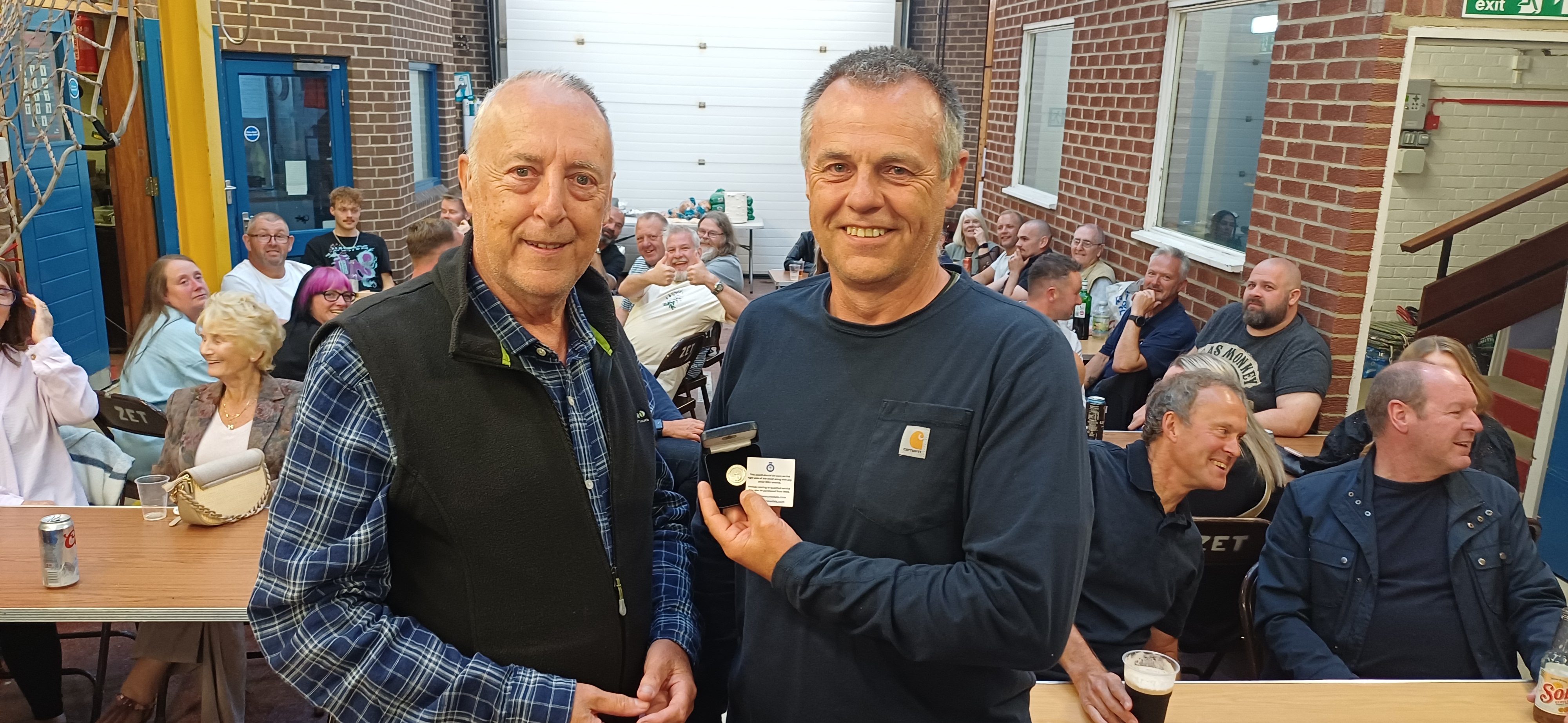 Dave Cocks presents Mike Picknett with his 40 years medal