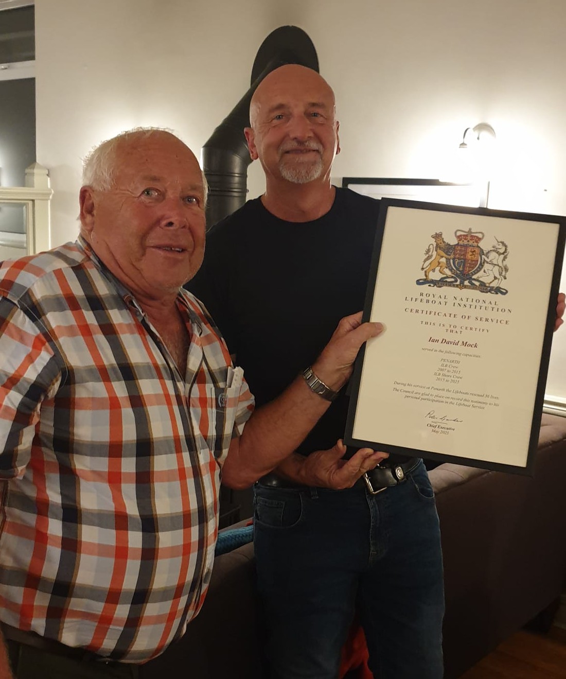 Ian Mock receiving long service award from Gareth Wigmore