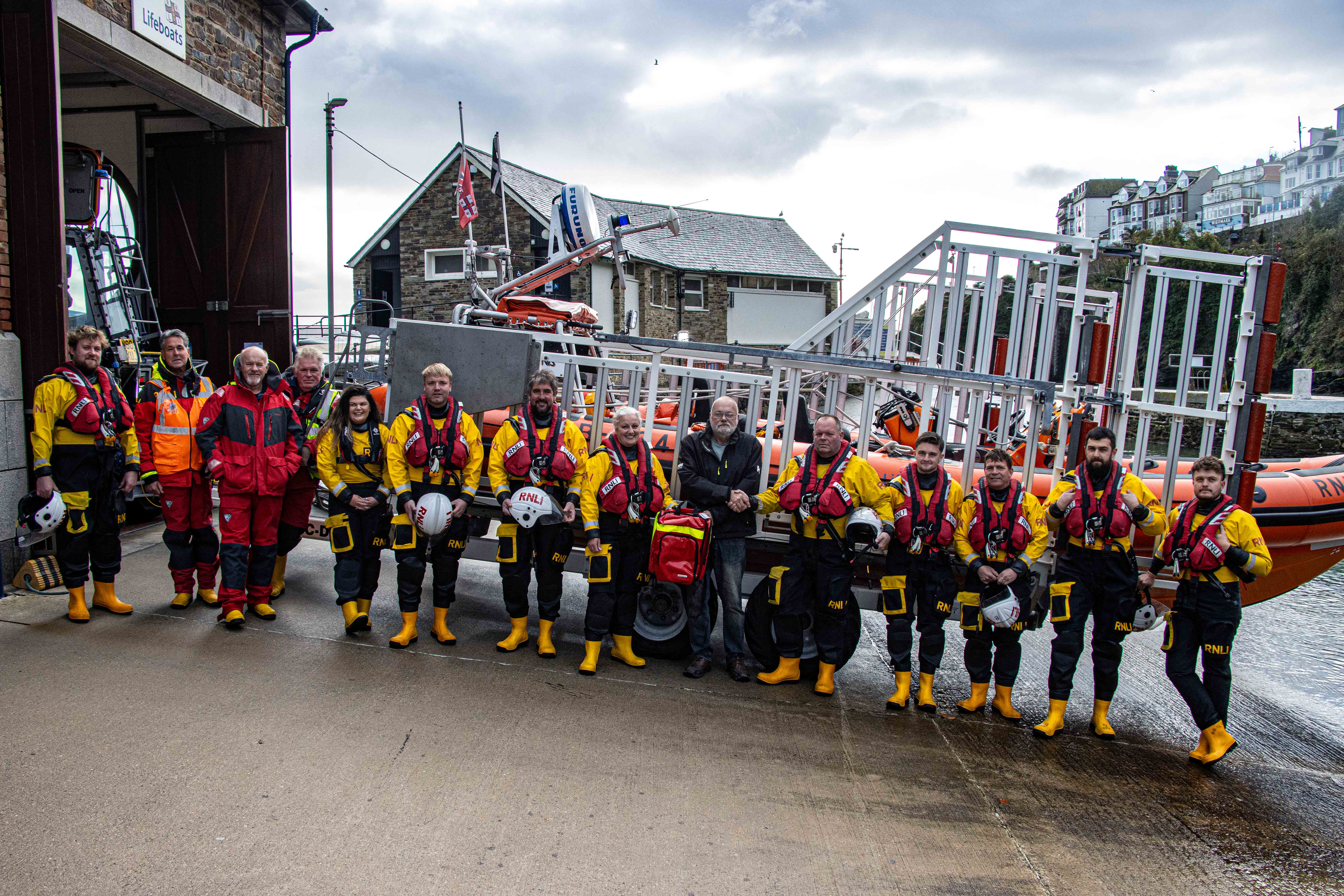 Looe RNLI volunteer crew with Richard Davies