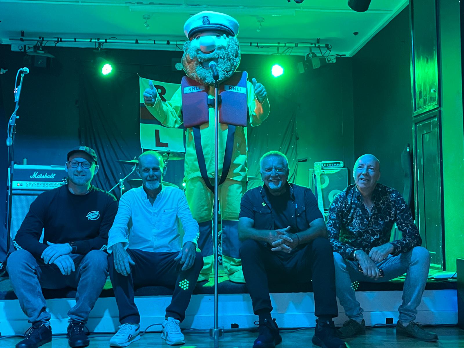 Stormy Stan meets rock band, Snake Eyes, at the Exmouth RNLI "Rocking for the RNLI" event