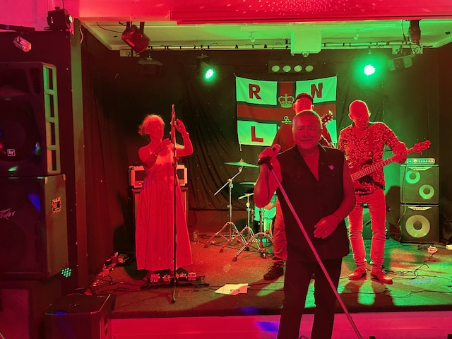 Rock band, "Snake Eyes", performing at the Exmouth RNLI fundraising event