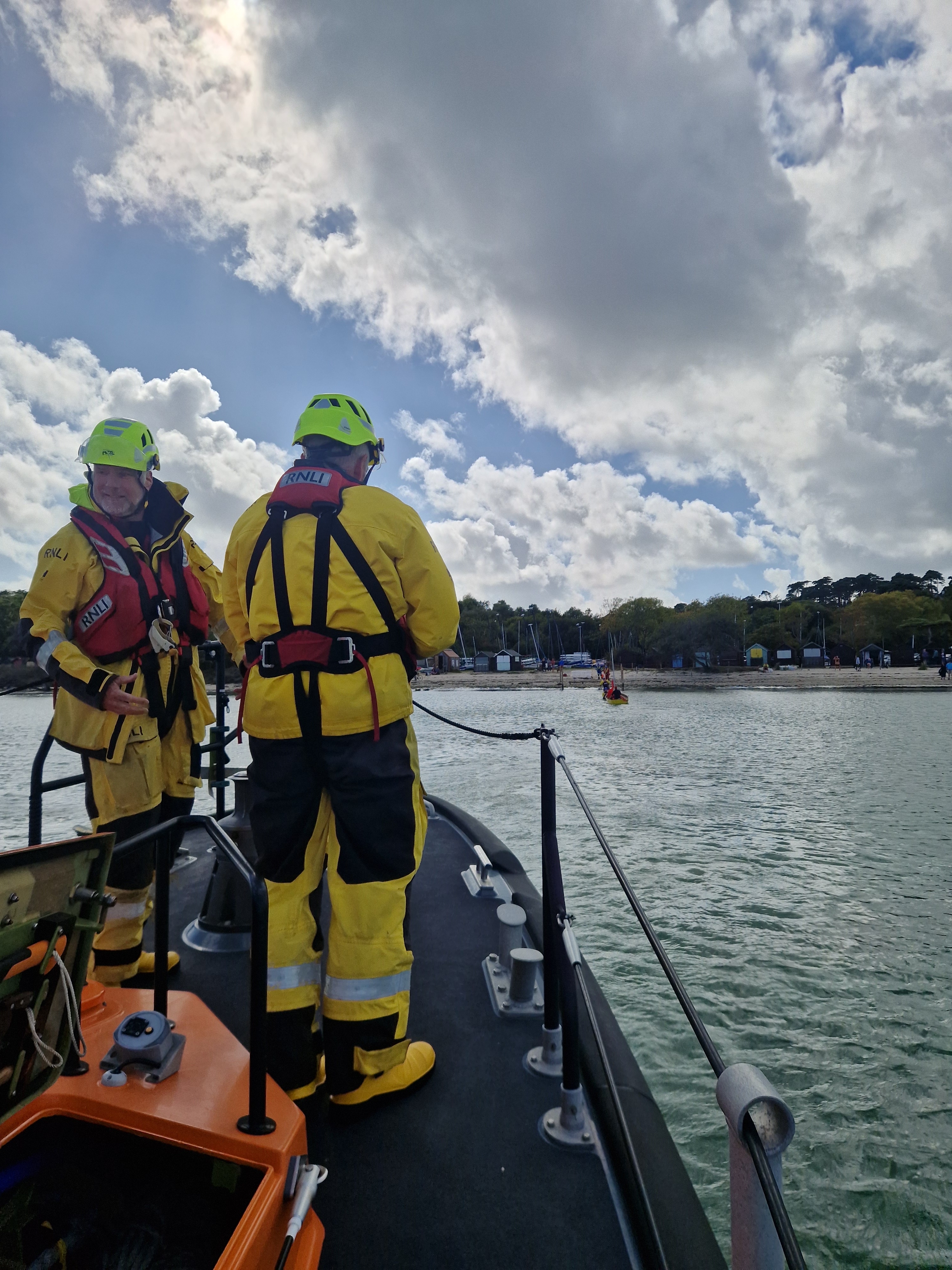 Dinghy returning to Knoll Beach from Swanage all-weather lifeboat.