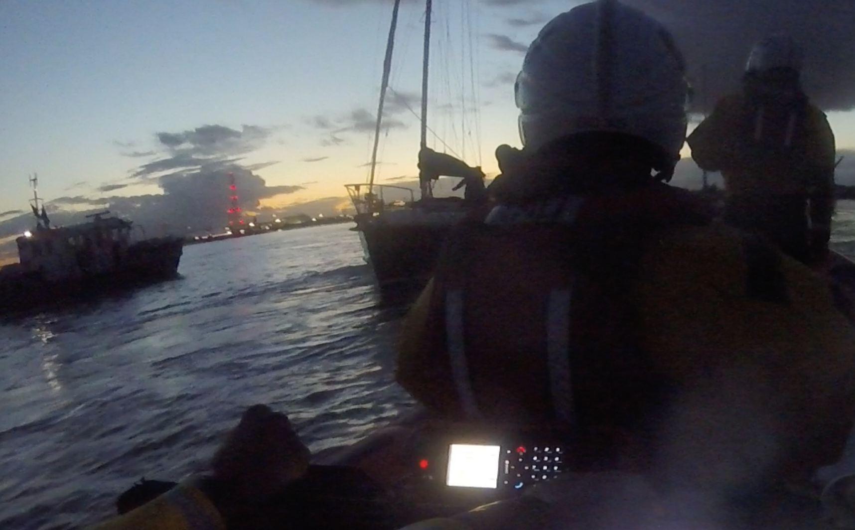 Casualty yacht seen from Gravesend Lifeboat with Harbour Launch Kew nearby
