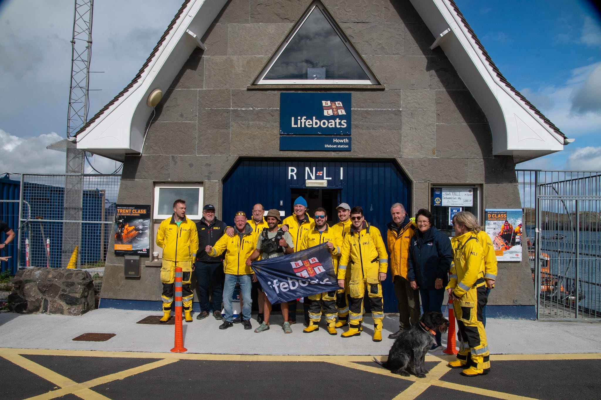Howth RNLI volunteers celebrate with Vini Cardoso on his return to Howth on Saturday 13 September.