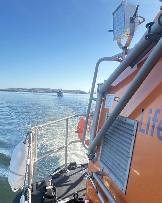 RNLI Invergordon with Trawler in tow