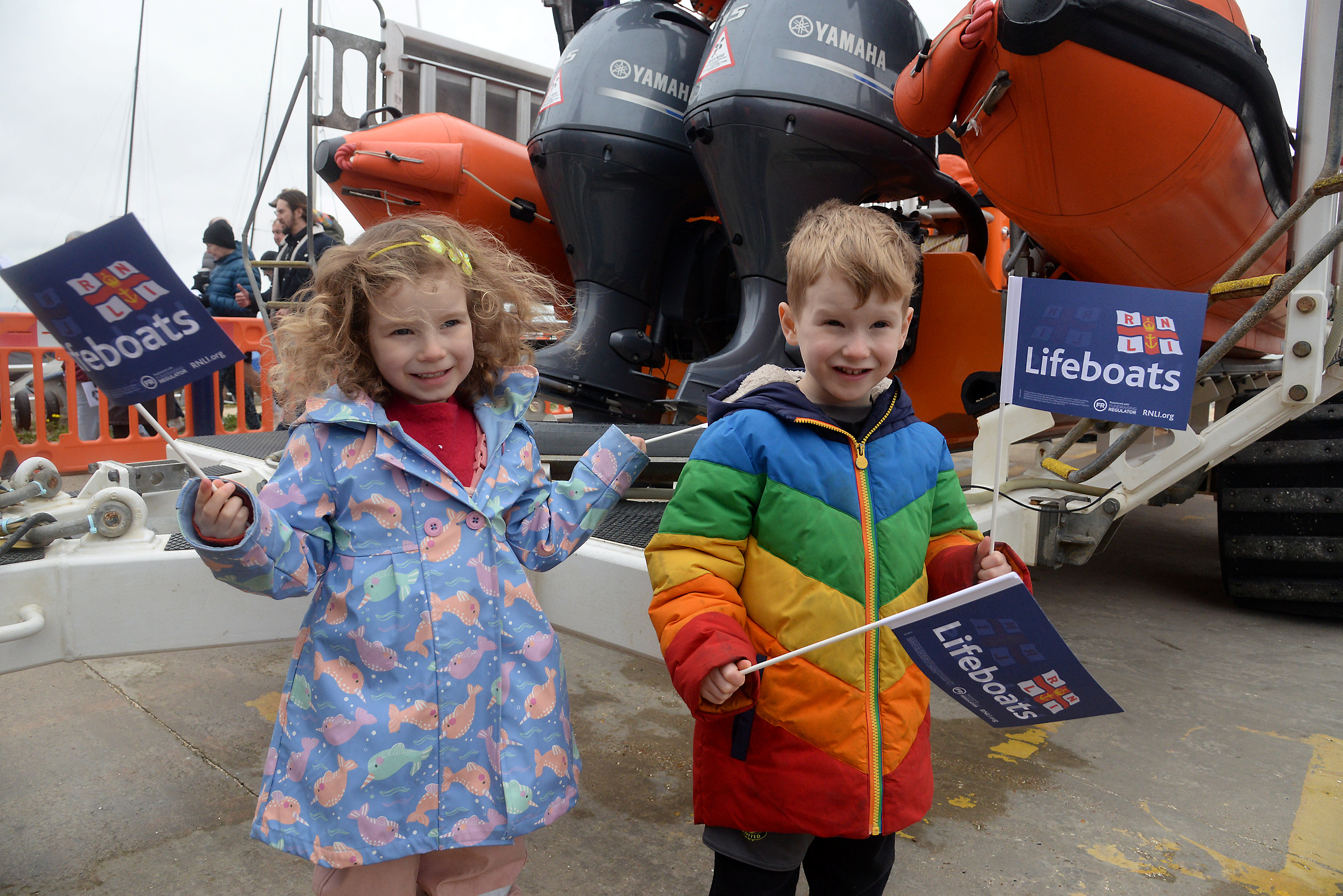 Lola and Rumi, both 4 fly the flags at the Whitstable RNLI Easter Fair on Good Friday.