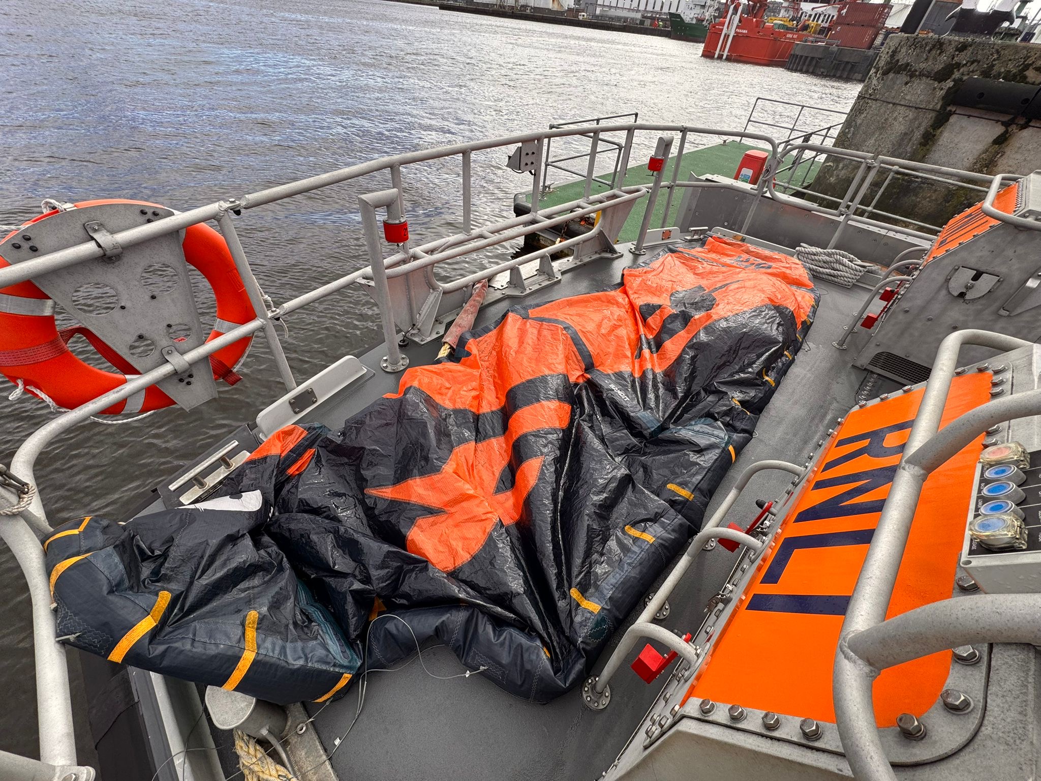 image shows kite surf on the deck of the lifeboat having been recovered by the crew