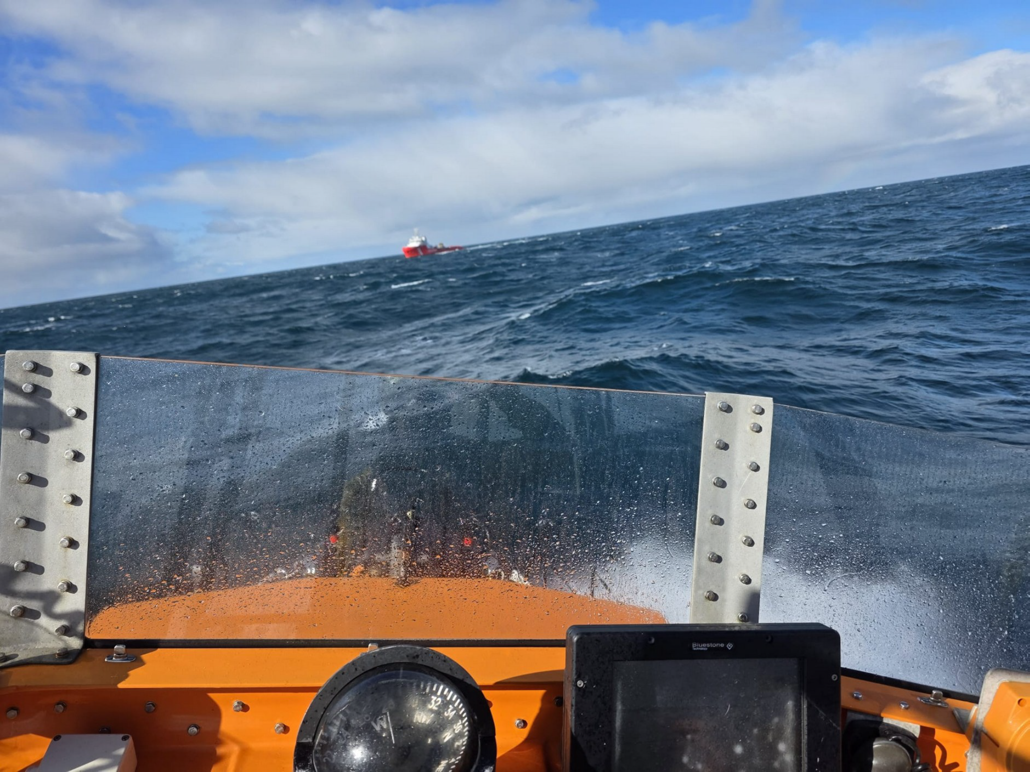 HM Coastguard tug arriving on scene taken from Wick RNLI lifeboat on Good Friday rescue