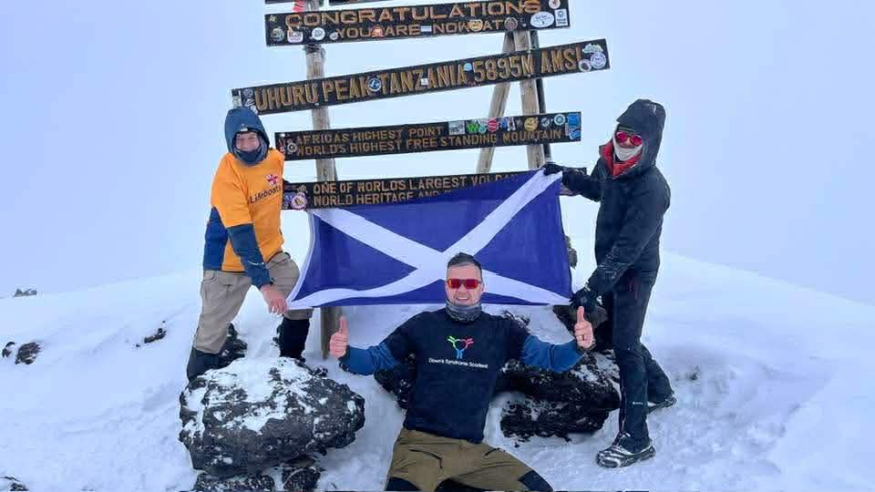 The three adventurers at the summit