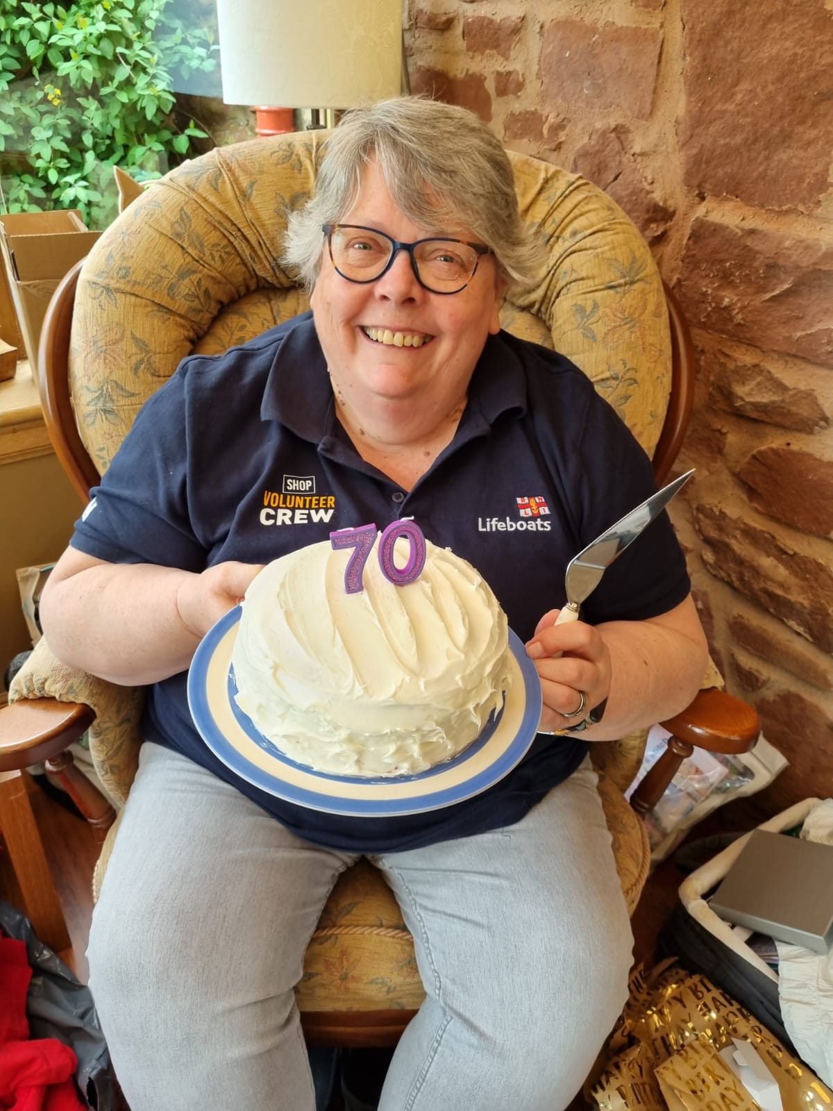 Woman on chair with cake