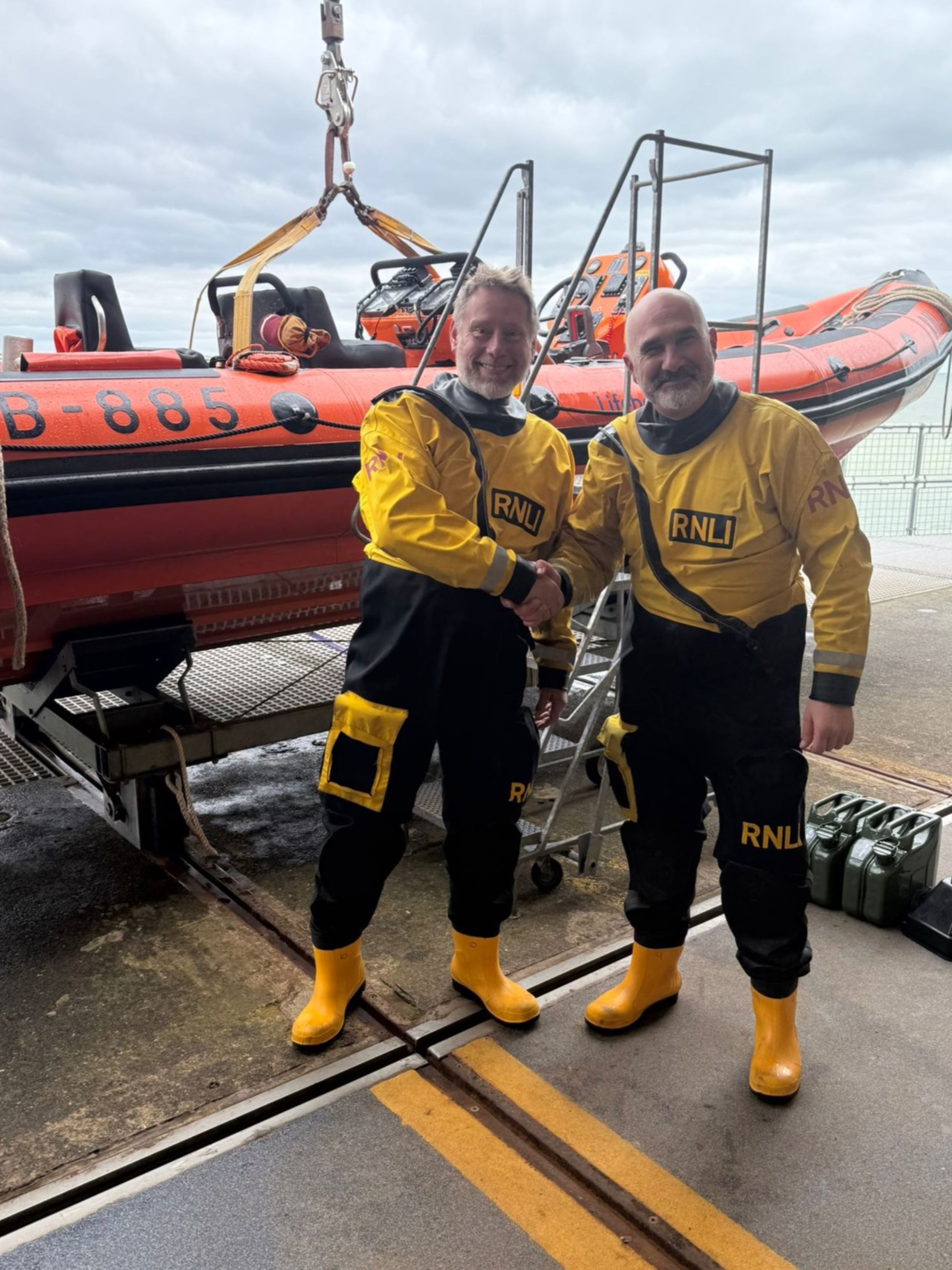 Chris Nicholls (left) with assessor Iain Keenan (right)
