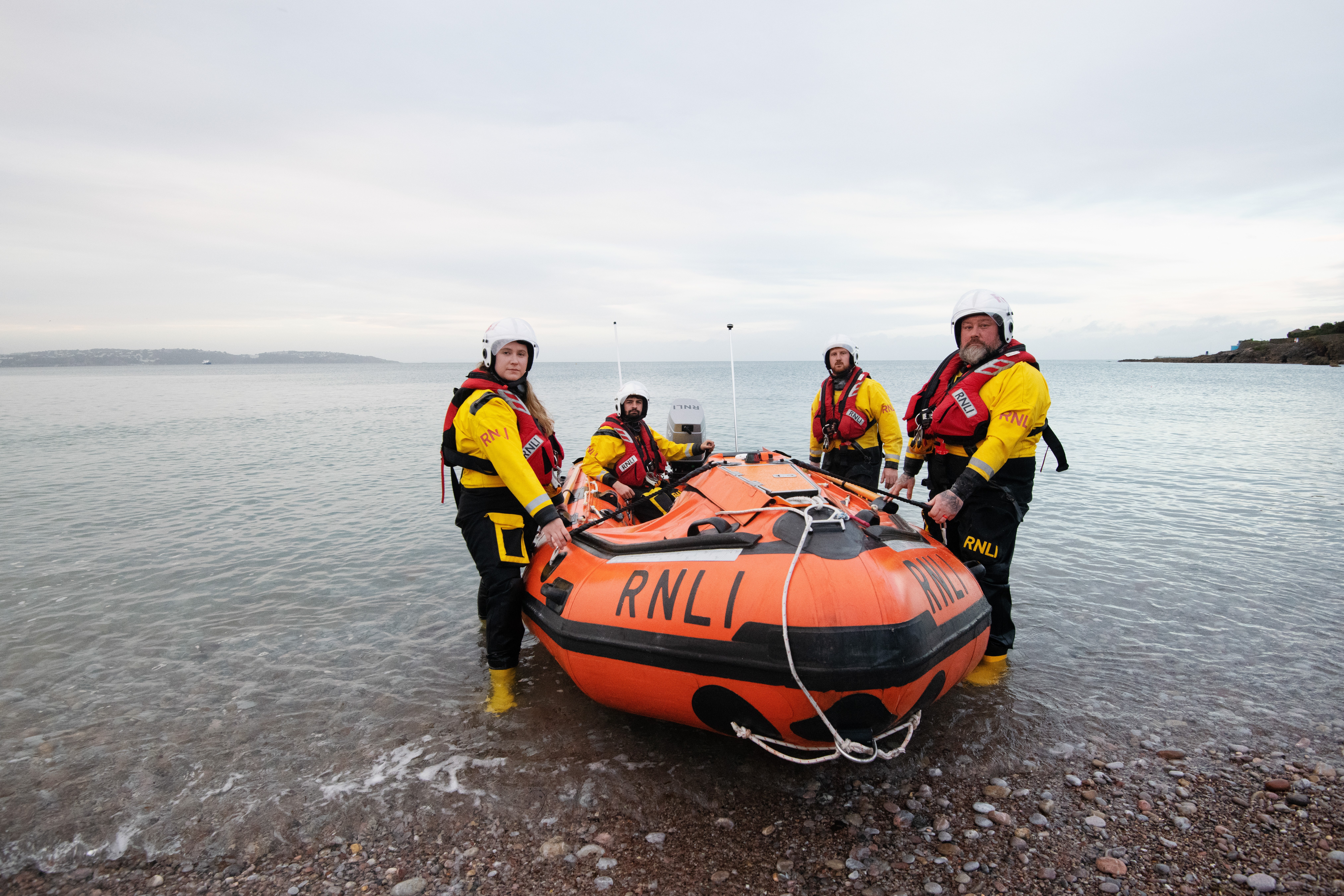 Torbay RNLI D-class Inshore lifeboat &amp; four crew members