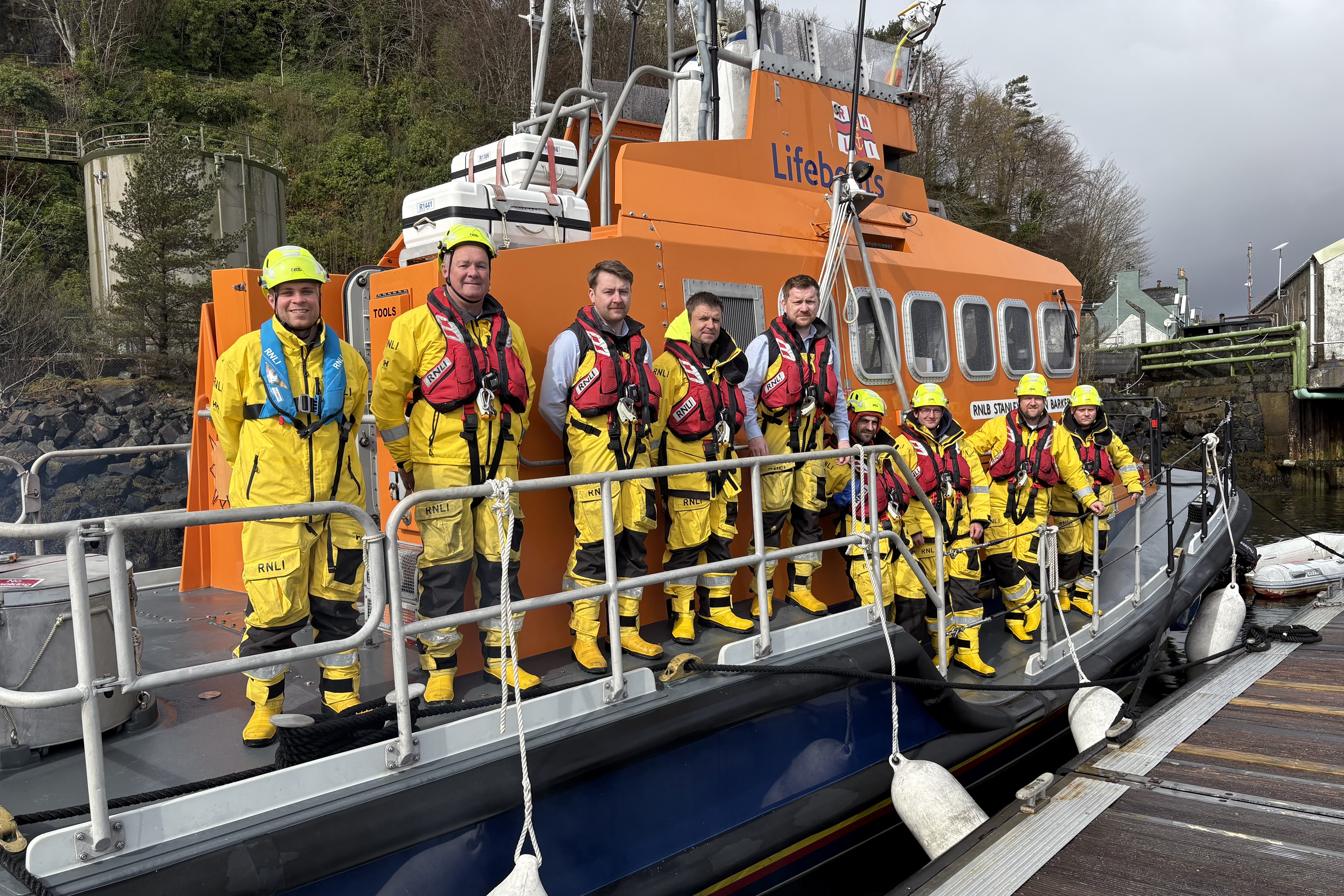 Portree RNLI crew onboard the outgoing lifeboat Stanley Watson Barker