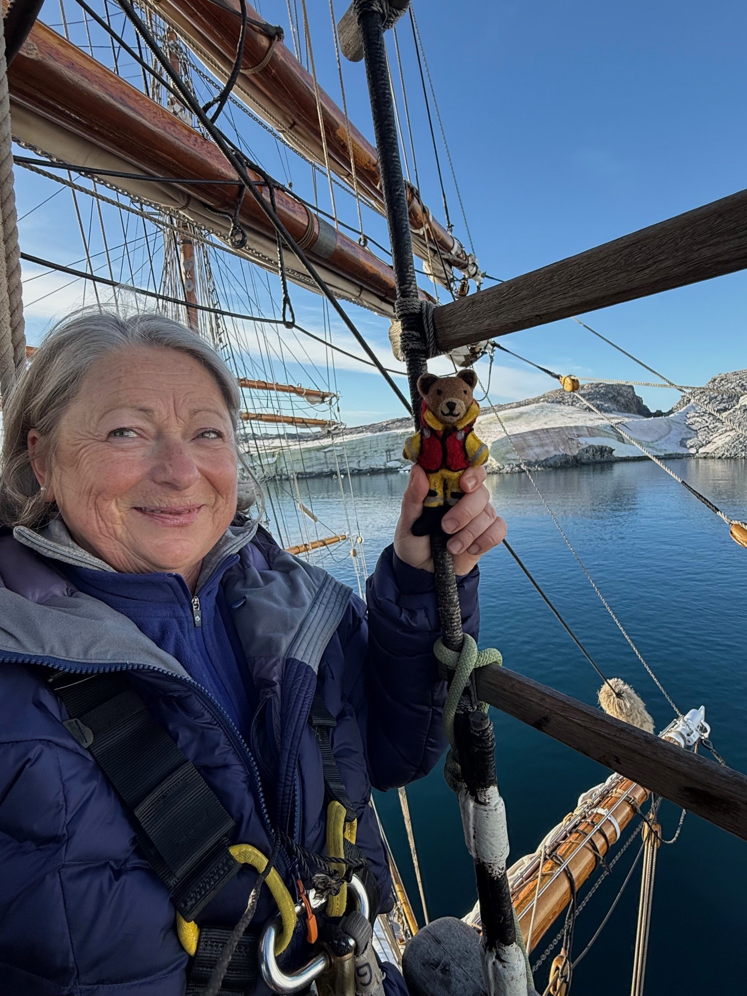 Yvonne with her trusty bear crewmate ‘Helly’, on board the square rigger Bark Europa in Antarctica.