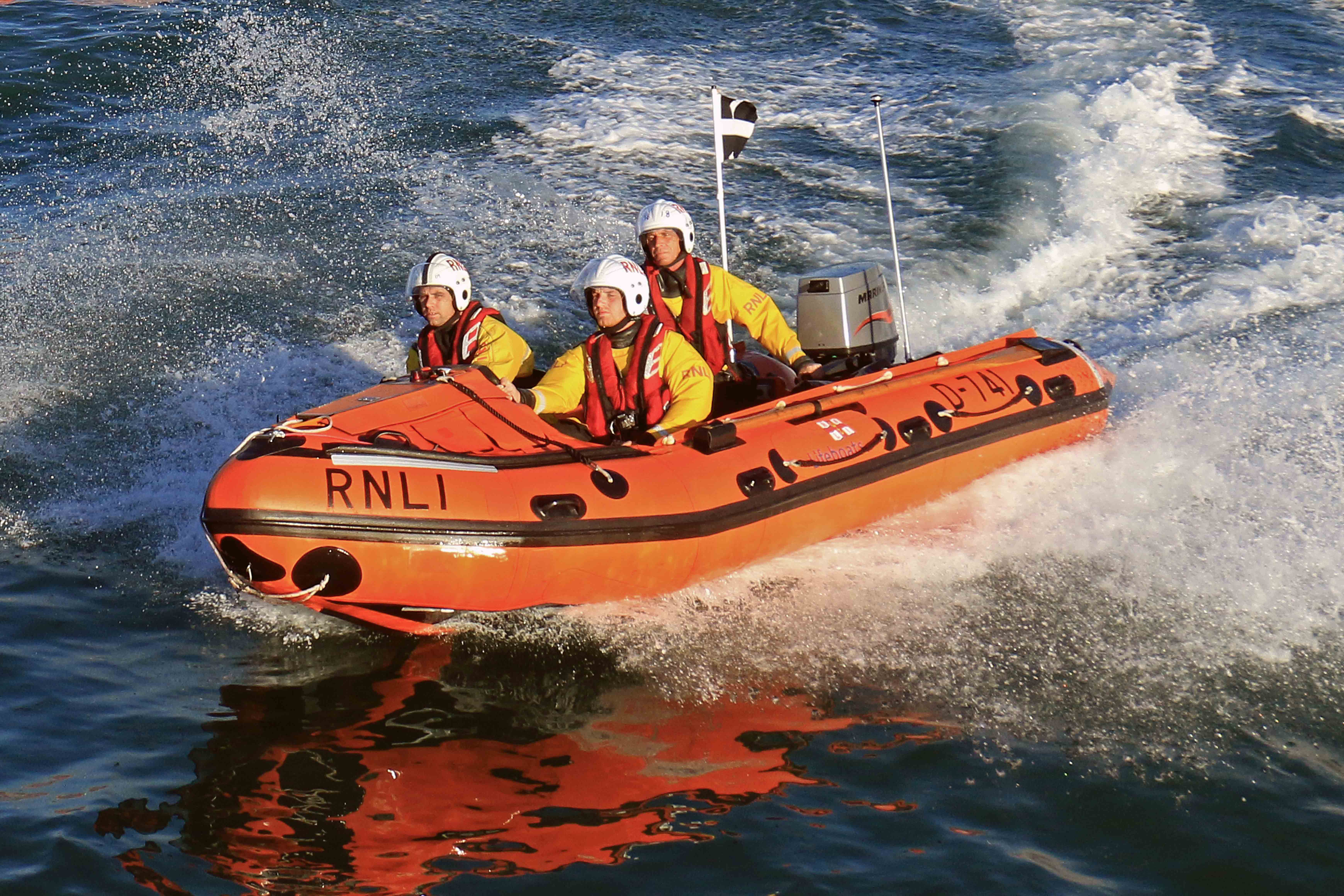 Brian Bowdler at the helm of the D Class inshore lifeboat D-741 Ollie Naismith
