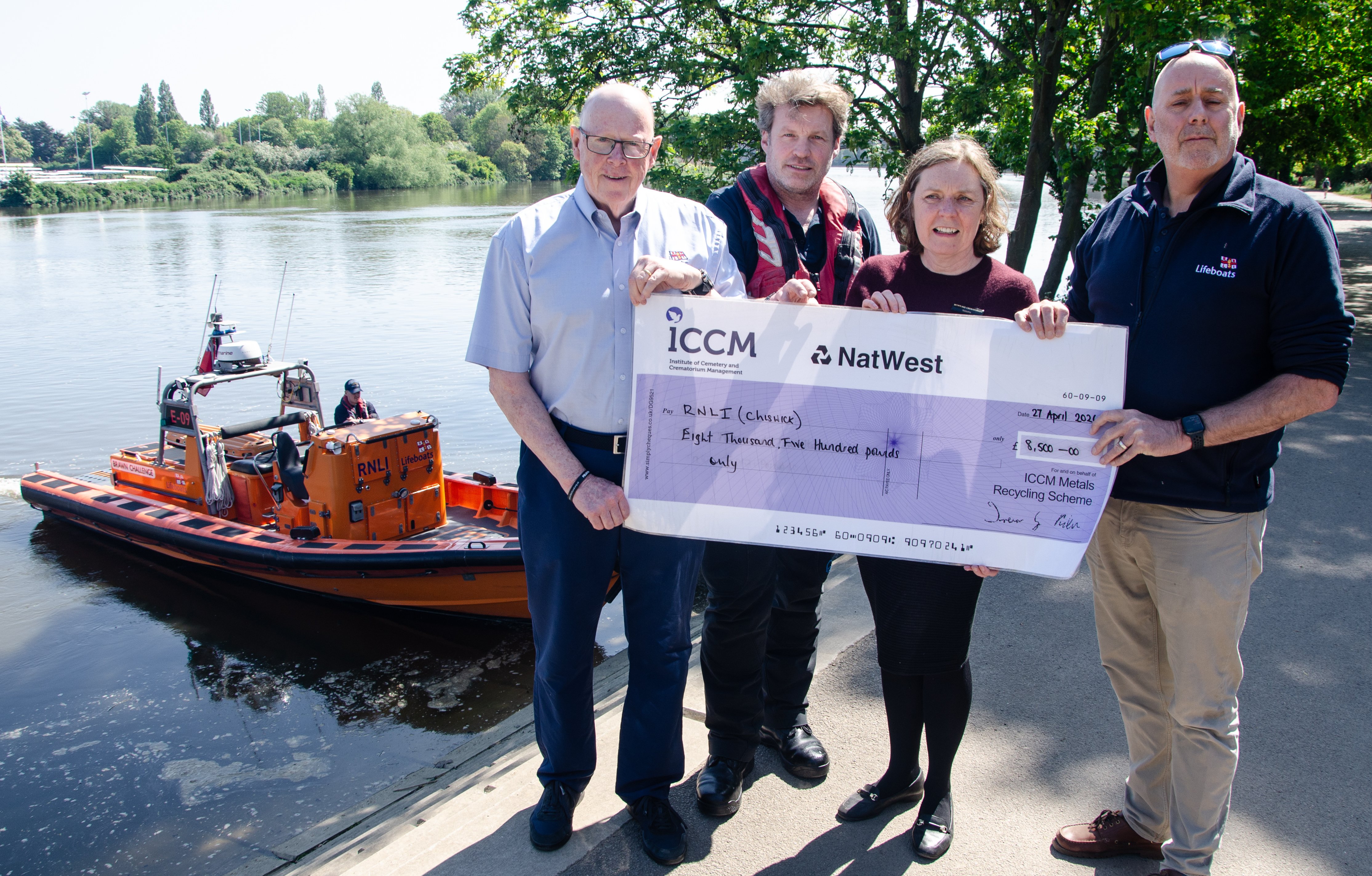 Crematorium Manager Natasha Bradshaw presents the donation