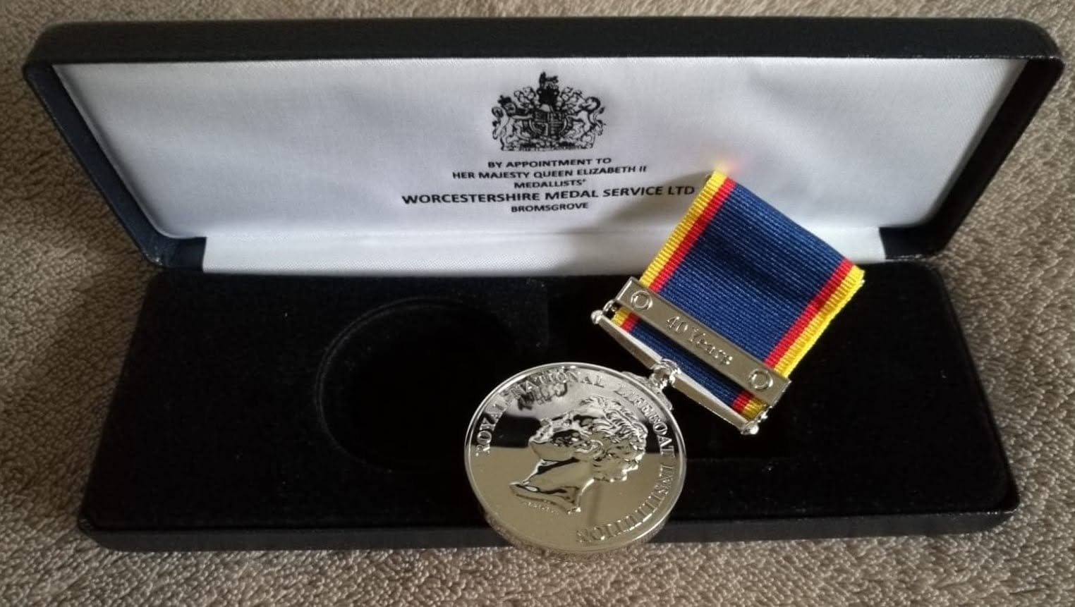 Paul’s silver medal for 40 years service 
