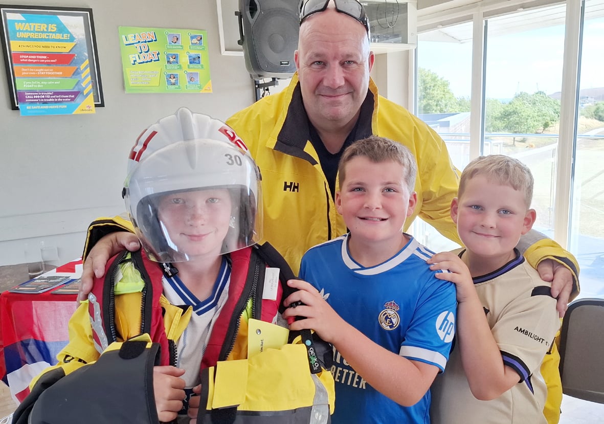 Hartlepool RNLI visits officer Jimmy Slaughter with youngsters(left to right) Joseph Bage, William Butler and Jack Butler.