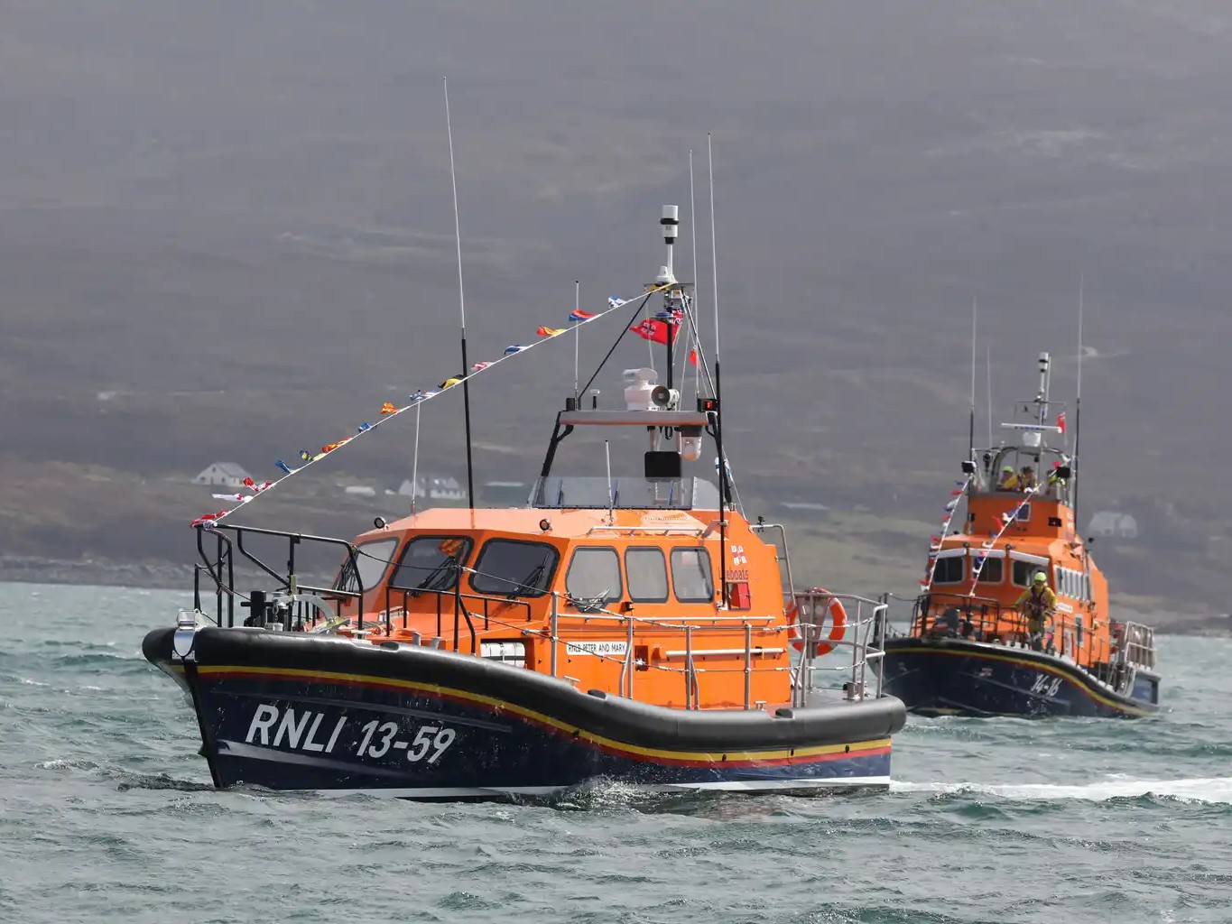 The brand new Portree lifeboat Peter and Mary arriving at Portree for the first time in 2026, with Stanley Watson Barker behind.
