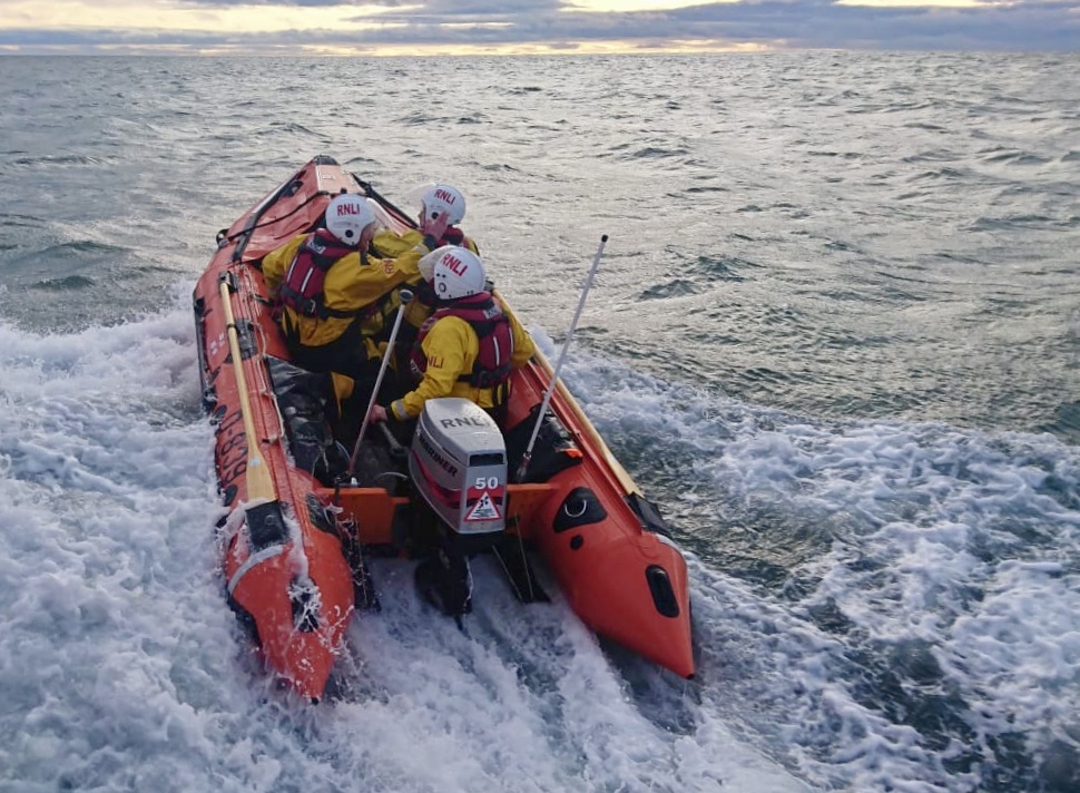 Craster lifeboat at sea with three volunteer crew aboard