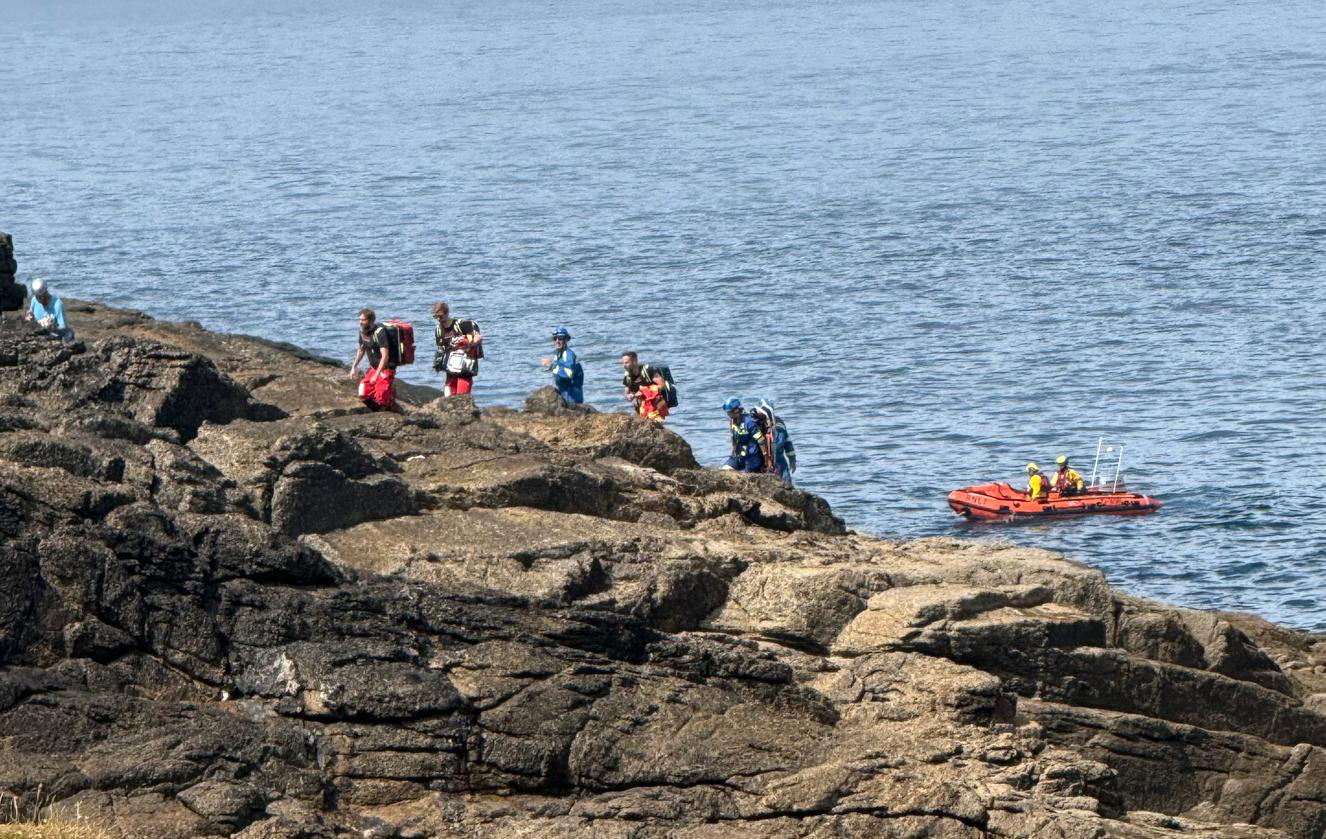 The emergency services leaving the scene, with Sennen Cove D class ILB 'Arangy' in the background.
