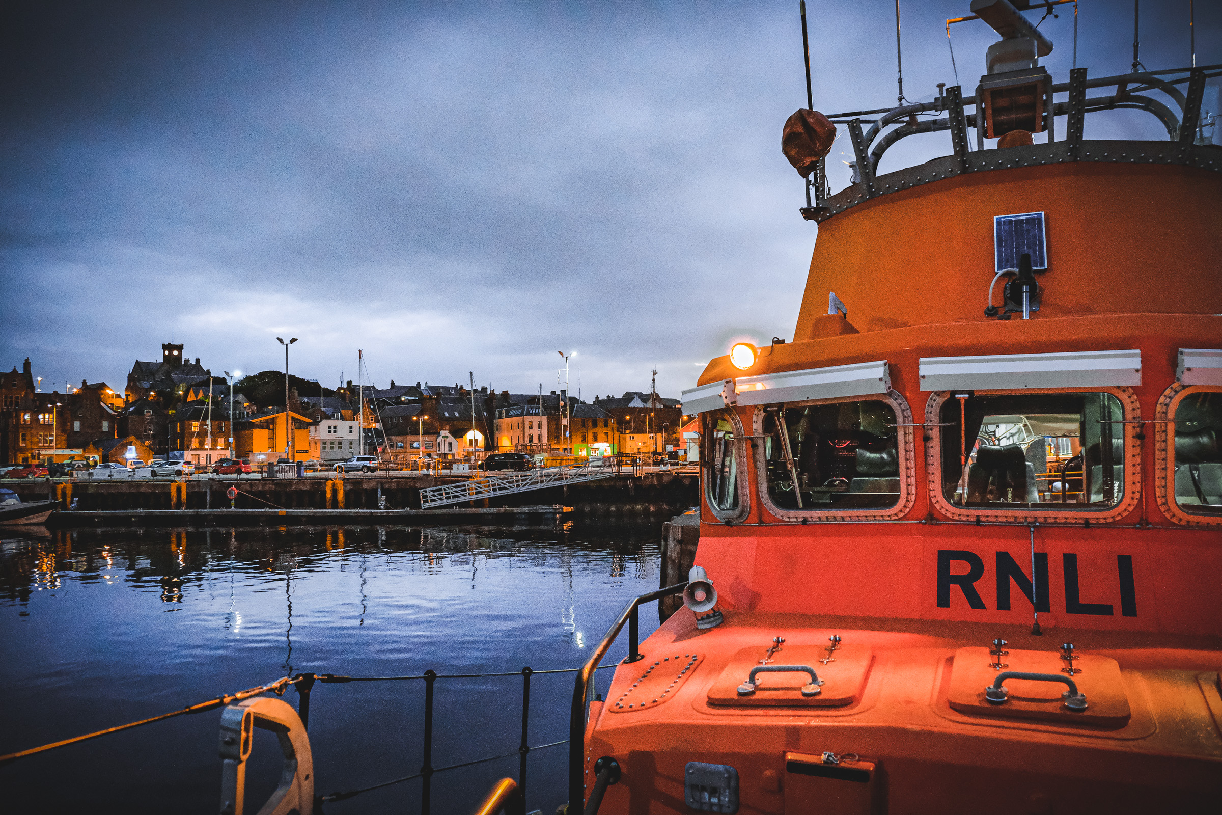 A view of Lerwick Lifeboat with skyline of Lerwick visible.