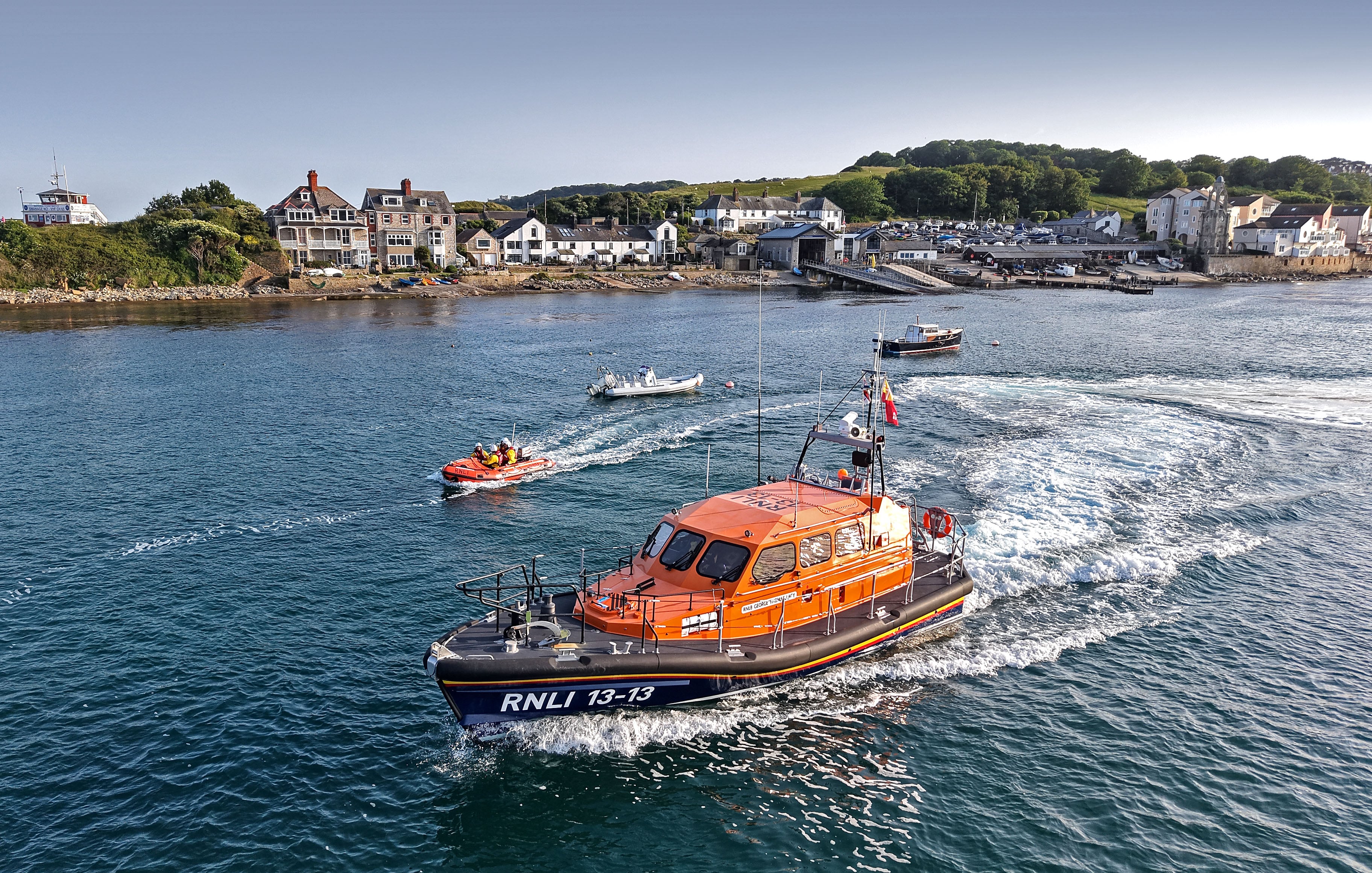 Both lifeboats leaving Swanage Lifeboat Station
