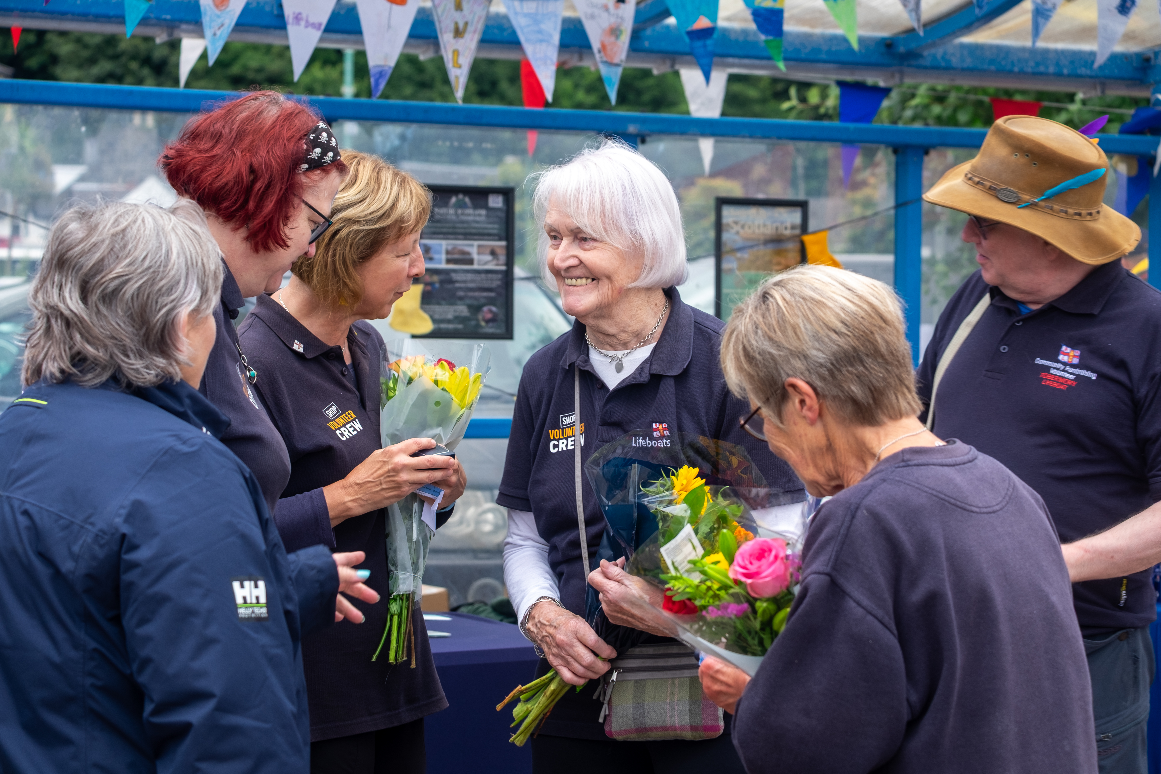 Volunteers Maggie, Inez and Christine receiving long service awards