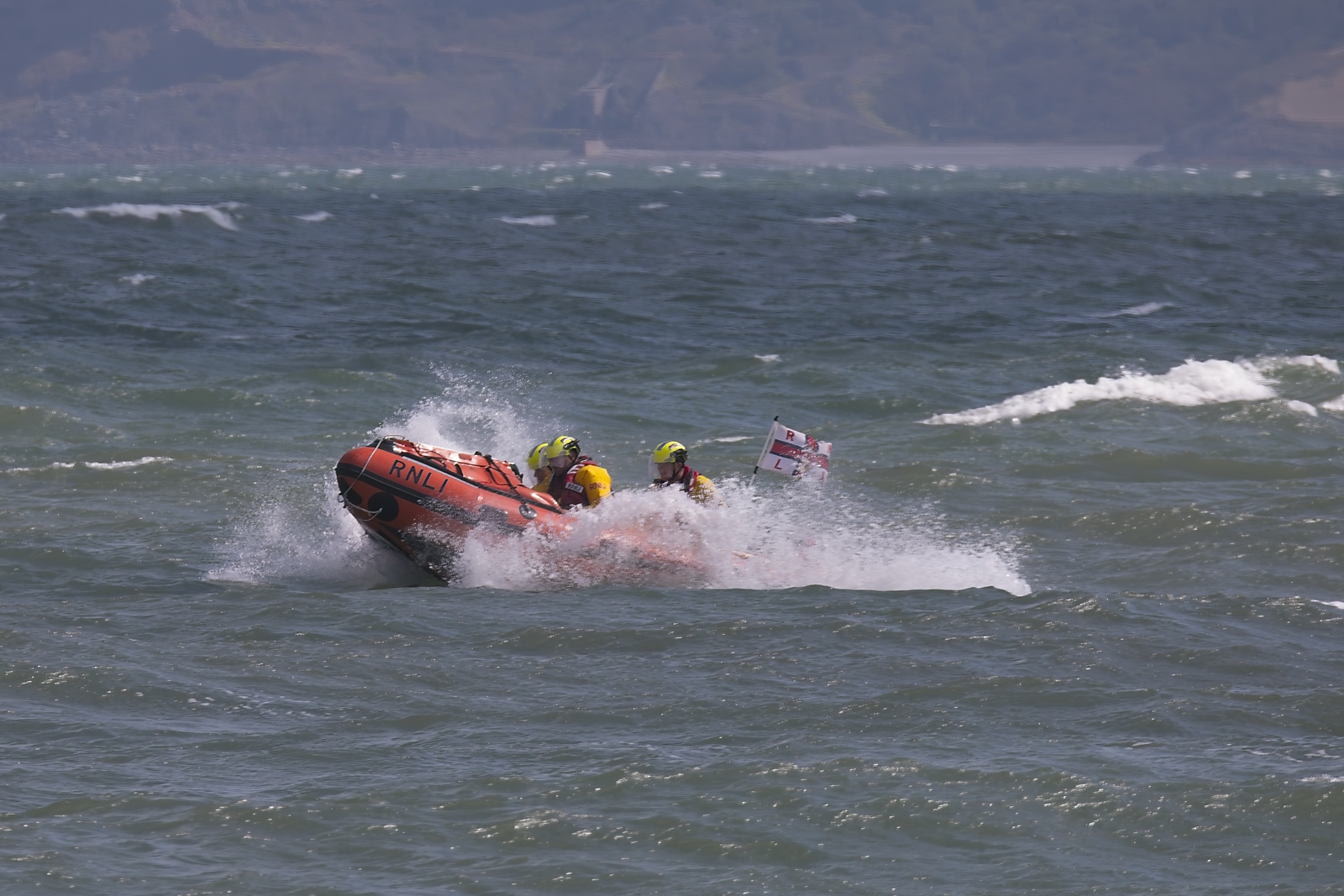 Inshore Lifeboat ‘Enfys2’ returning to RNLI Moelfre Lifeboat station following the call out.