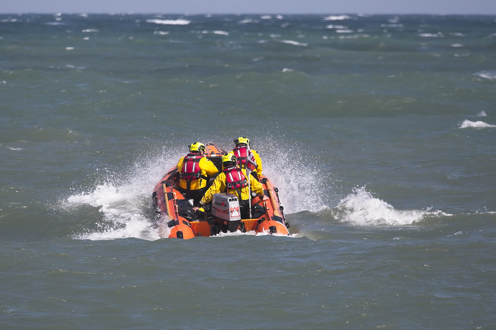 Inshore Lifeboat ‘Enfys2’ returning to RNLI Moelfre Lifeboat station following the call out.