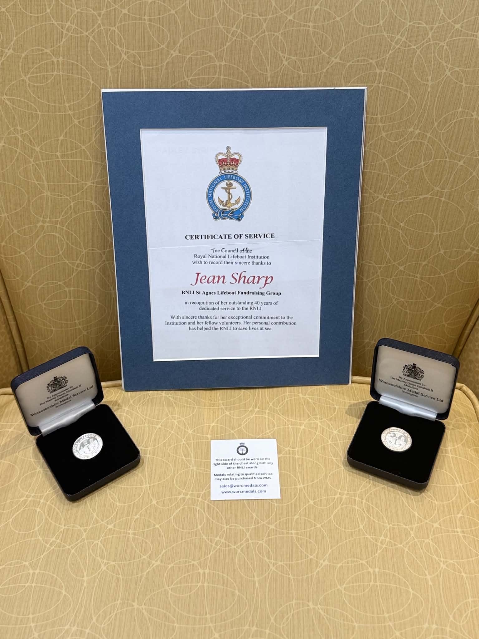 One certificate and two medals.