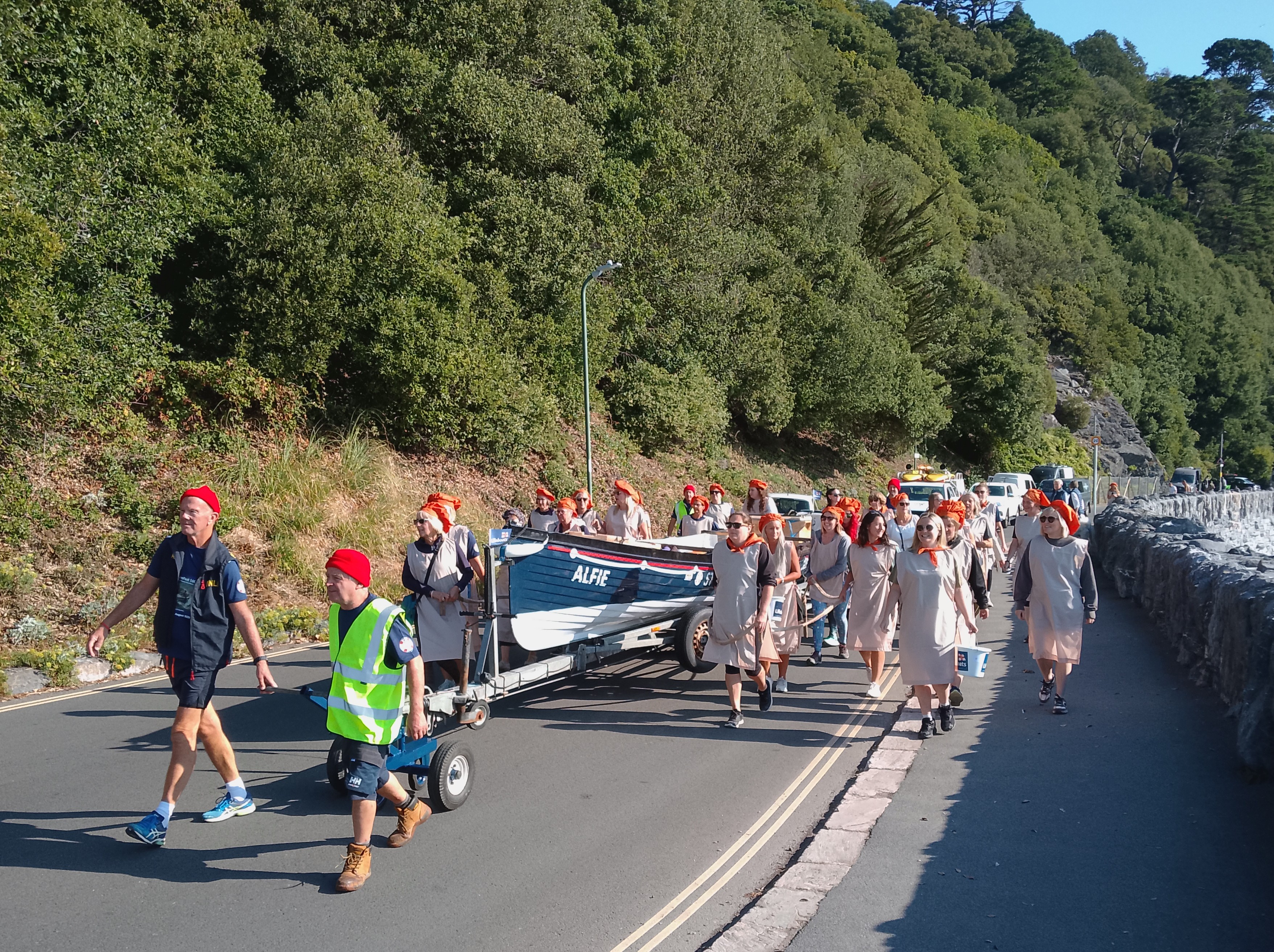 The gig boat being pulled at Meadfoot Beach, Torquay