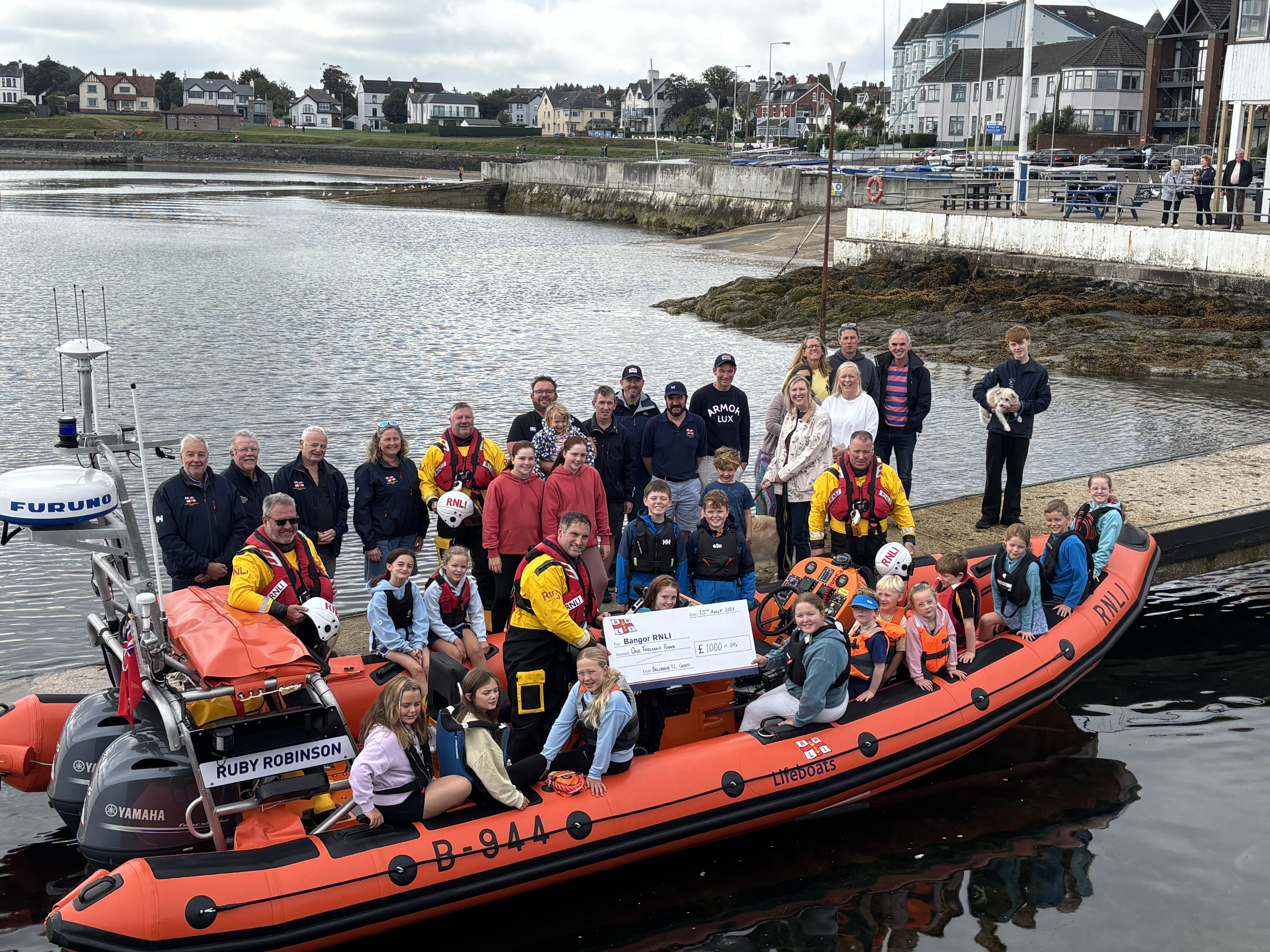 RNLI crew receive cheque from BHYC 
