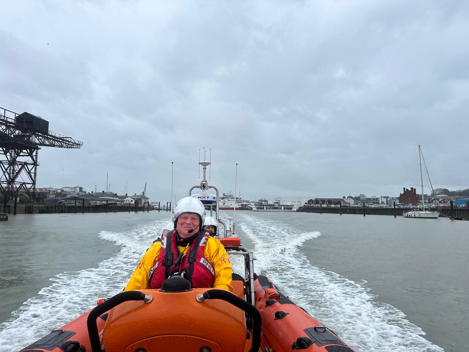 Andy Gissing sitting onboard Atlantic Lifeboat whilst underway in Cowes Harbour
