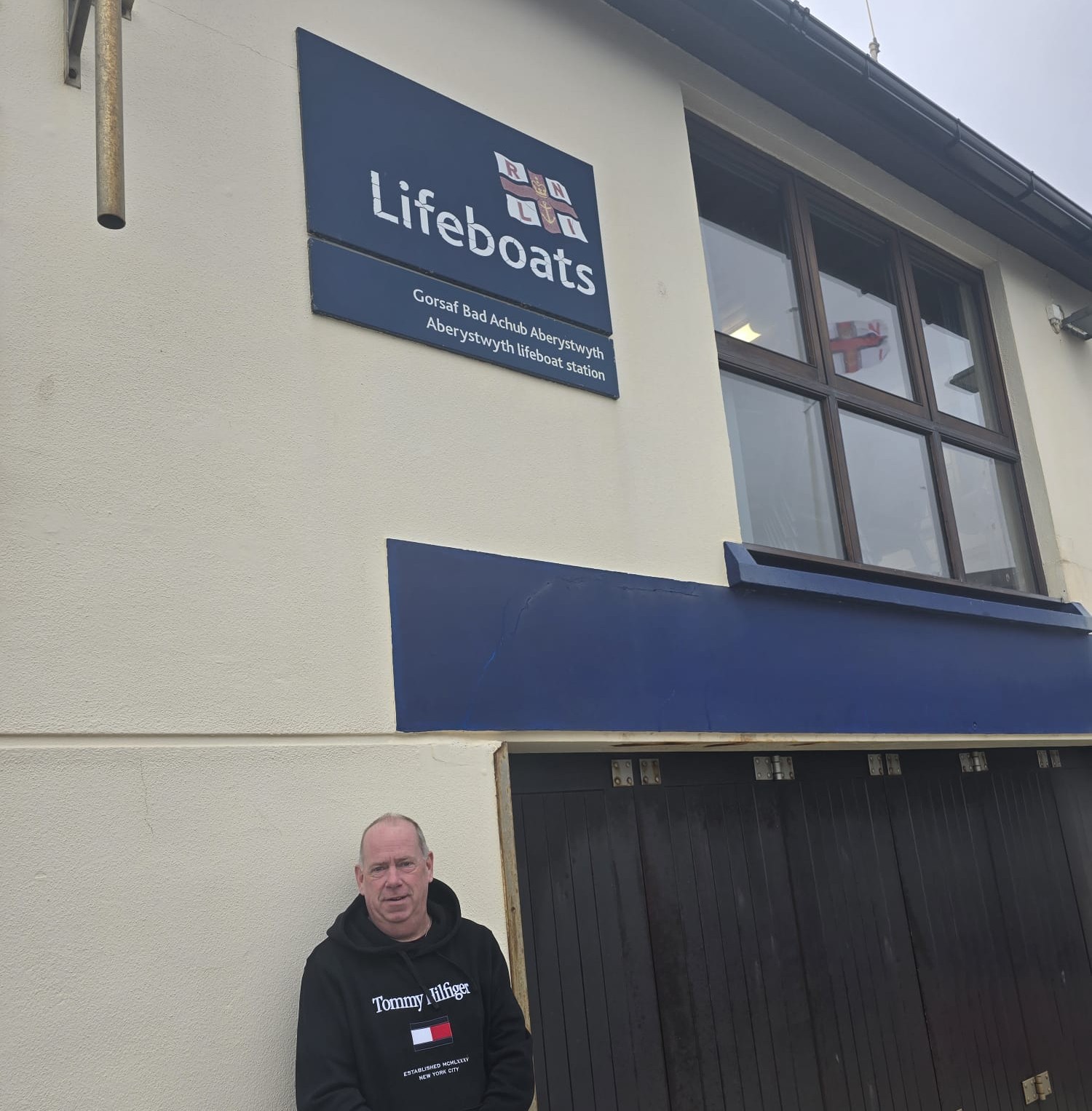 Matthew stood outside of the lifeboat station.